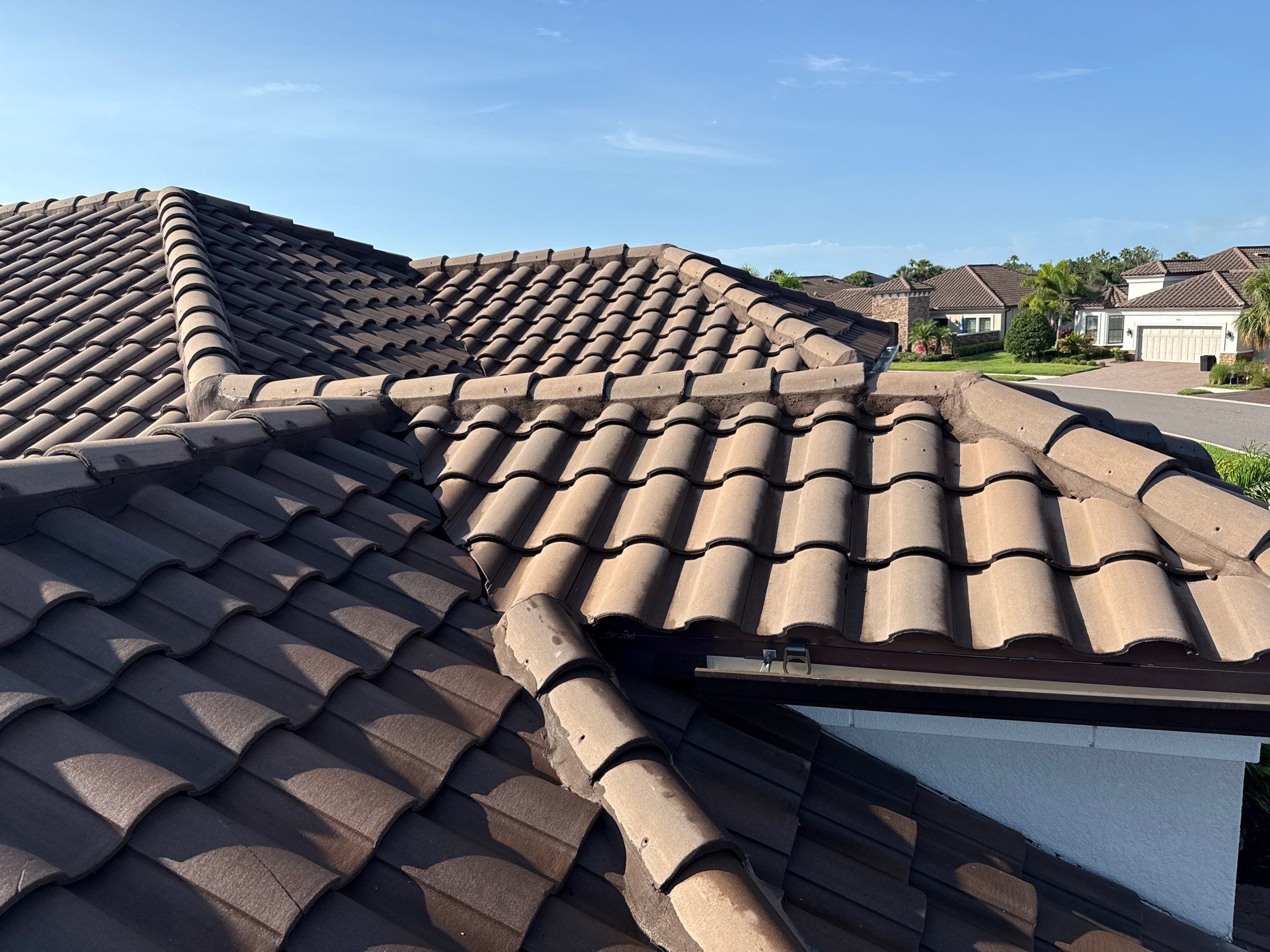 Concrete Tile Roof, Paver Driveway & Lanai Cleaning – Artisan Lakes Esplanade, Palmetto, FL by Sunshine AquaWash