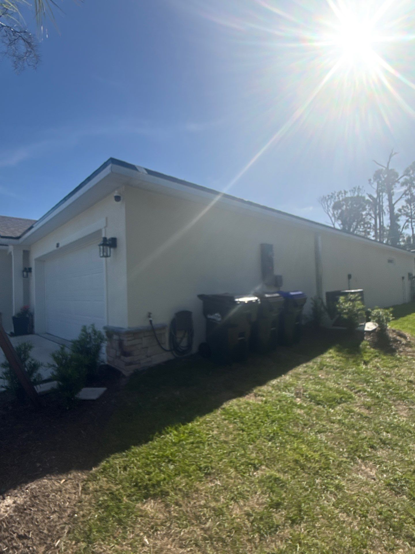 6-inch K-style White Seamless Gutters with Downspouts in North Port, FL by Gutter Professors
