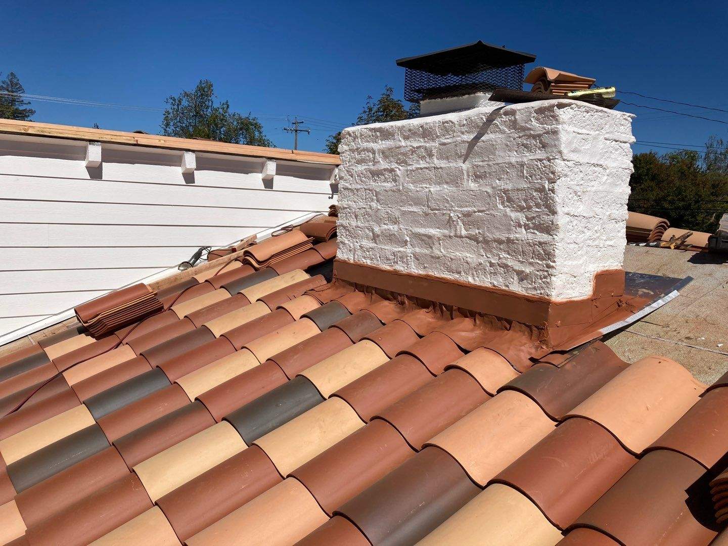 Los Gatos Wood Shake to Clay Tile Reroof and Restoration by Eastman Roofing & Waterproofing Inc.