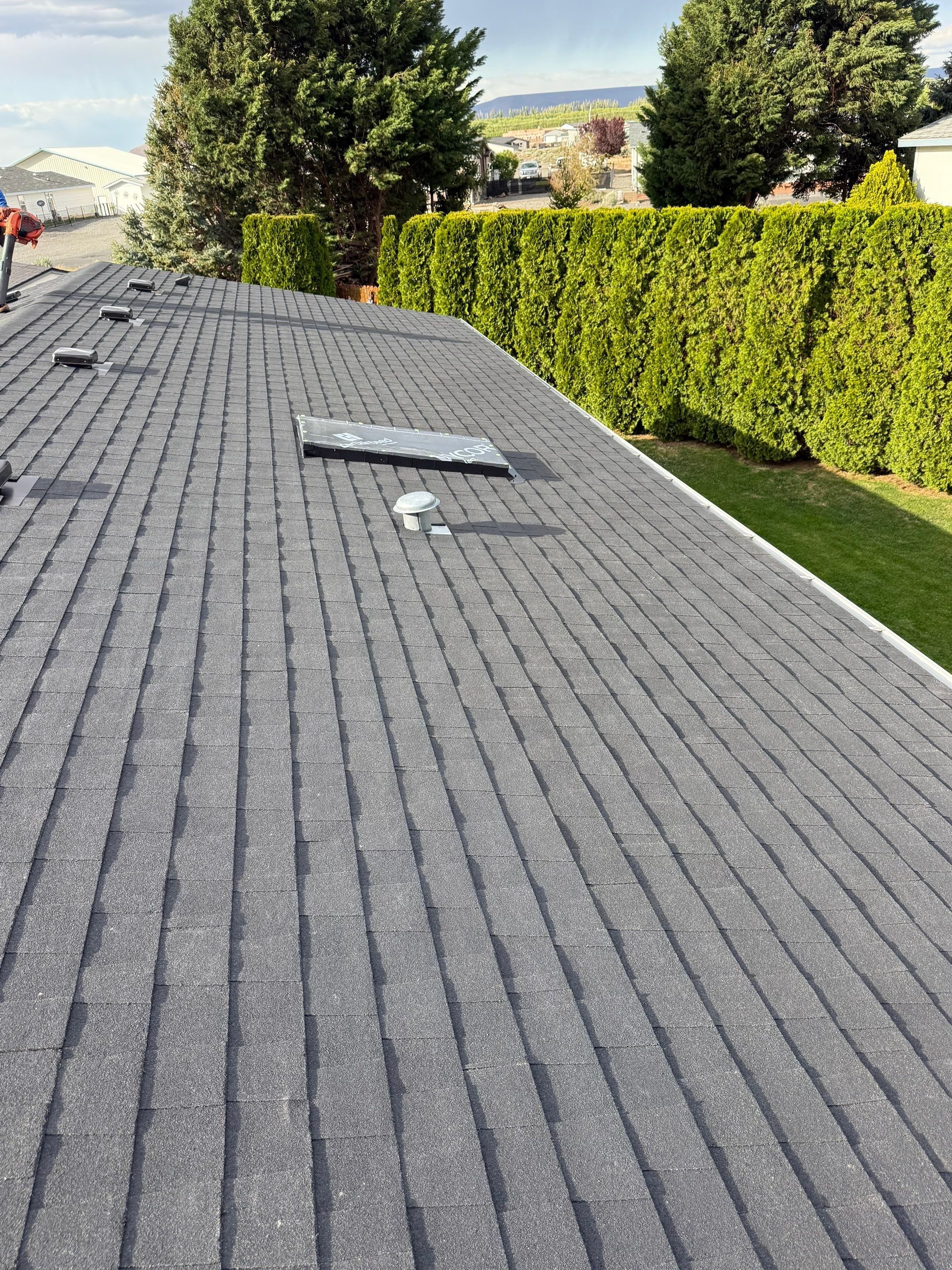 Residential Roof Replacement with Architectural Shingles and Skylight in Date Place Mattawa, WA 99349 The Denali System - 5-Star SureStart PLUS Coverage - CertainTeed 50 Year Material Guarantee - CertainTeed Workmanship Guarantee: 30 Years - CertainTeed Warranty Transfer Period: 20 Years - Certainteed Landmark® Shingle - Cinder Black by Alpine Roofing