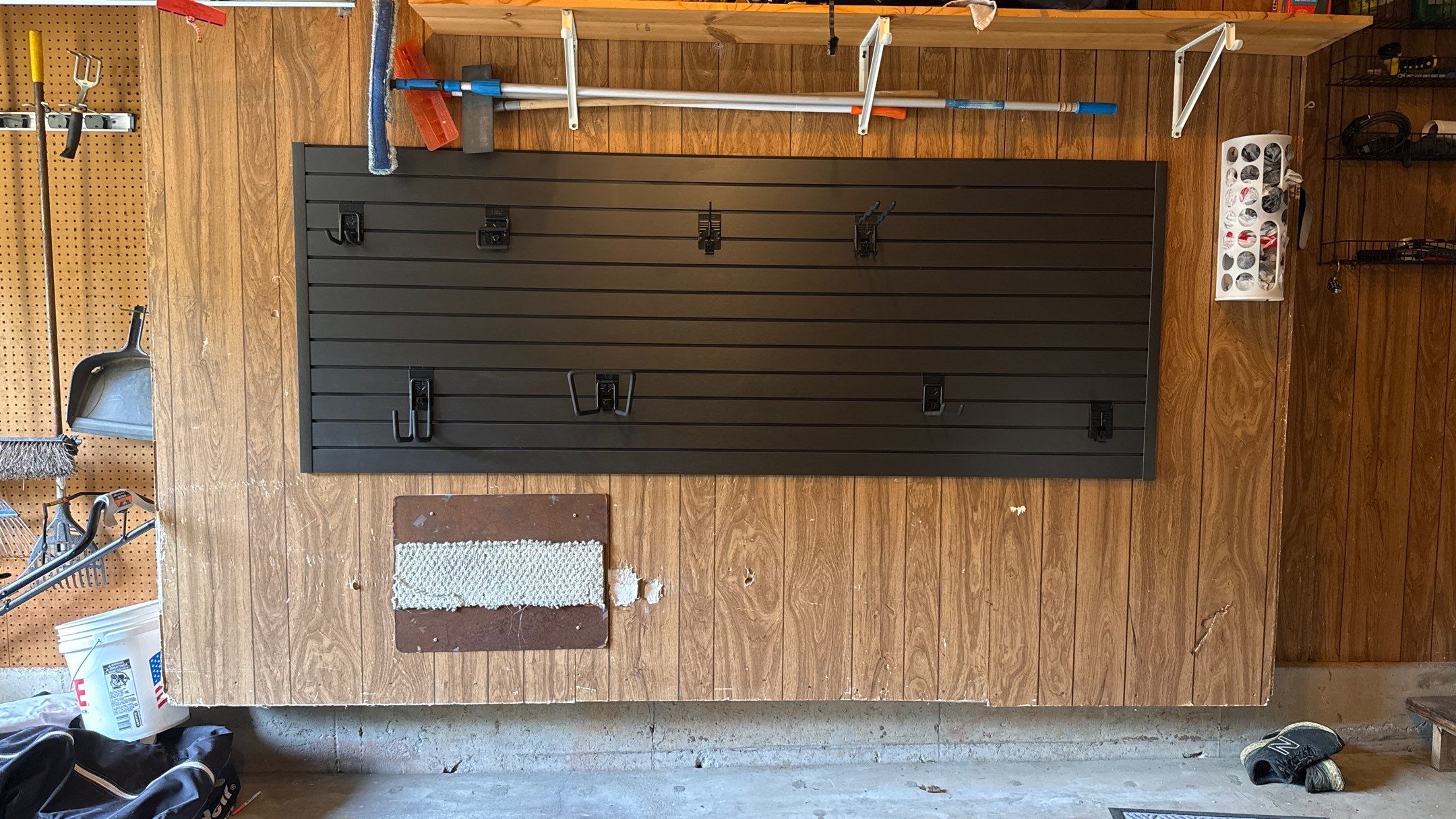 Custom Slatwall Storage System Installation in Overland Park Garage by Banner Garage