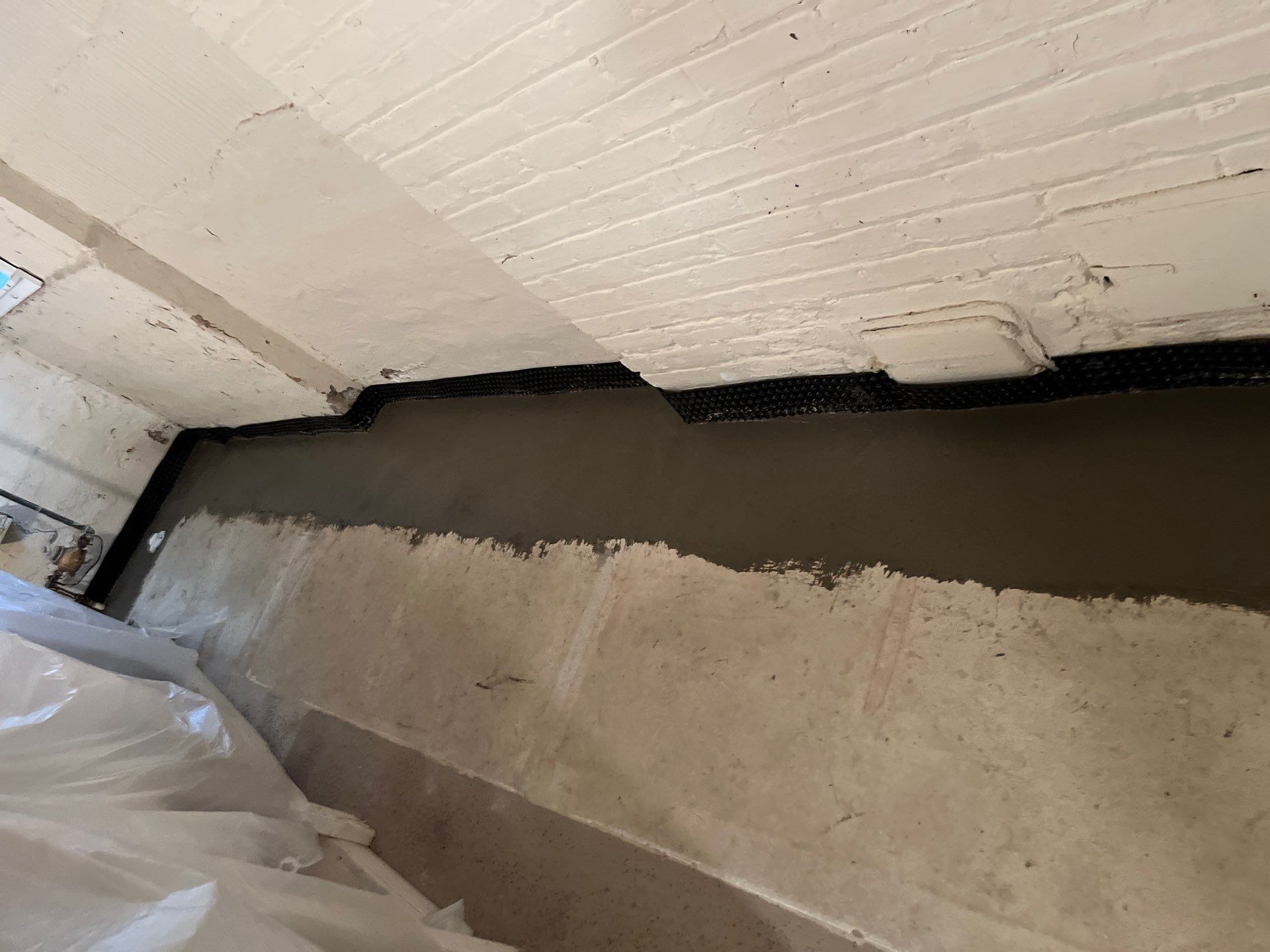 Berwyn- Interior Drain Tile System by Area Wide Waterproofing