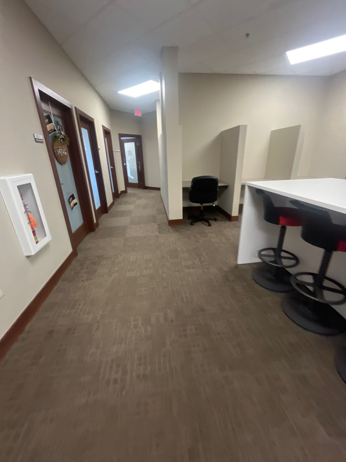 Commercial Office Interior Remodel and Modern Suite Refresh in Sioux Falls by Select Painting, Coatings & Garage Cabinets