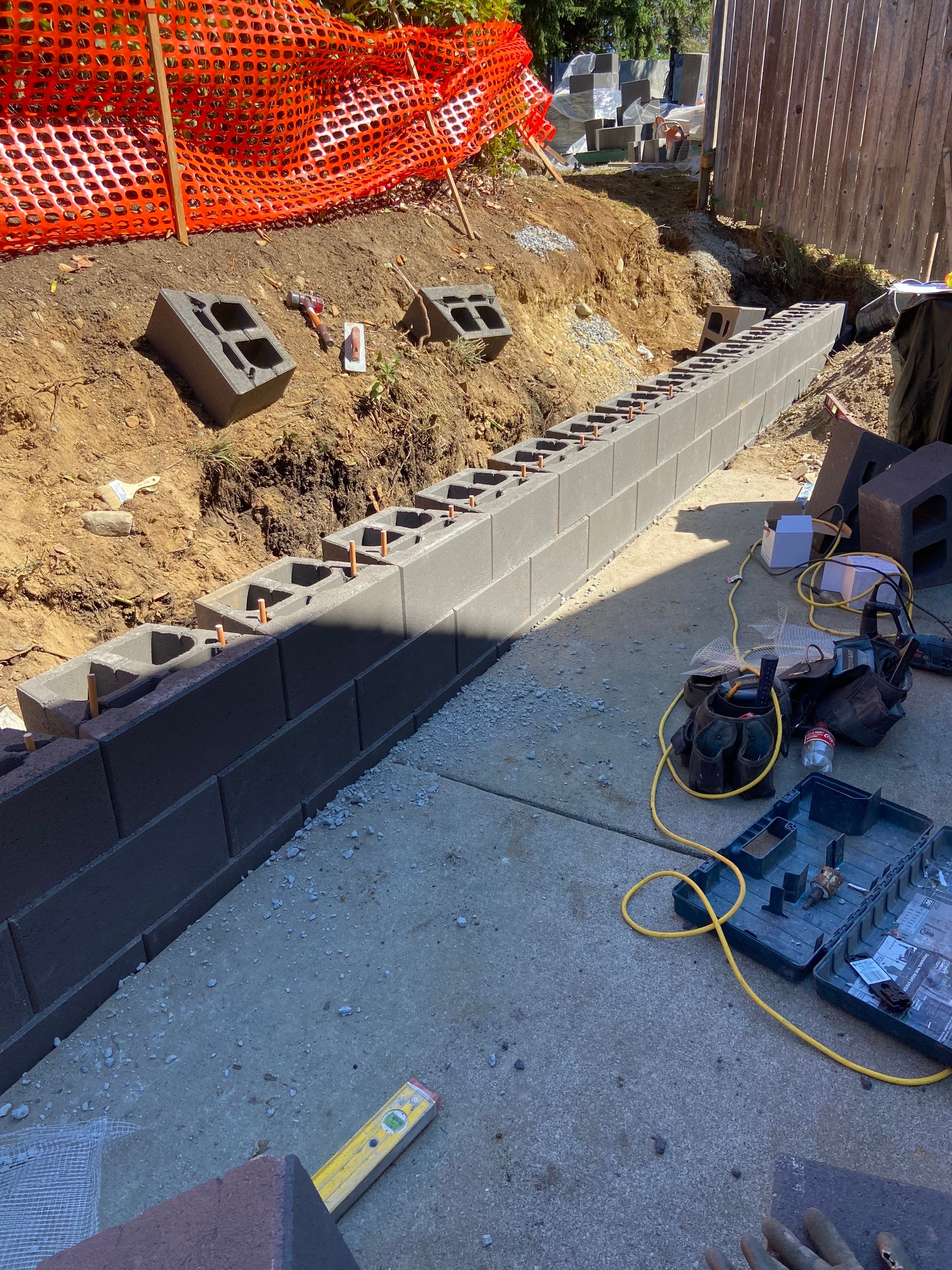 Jireh Outdoor Projects | Retaining Wall & Fence Build by Jireh Asphalt & Concrete Inc 