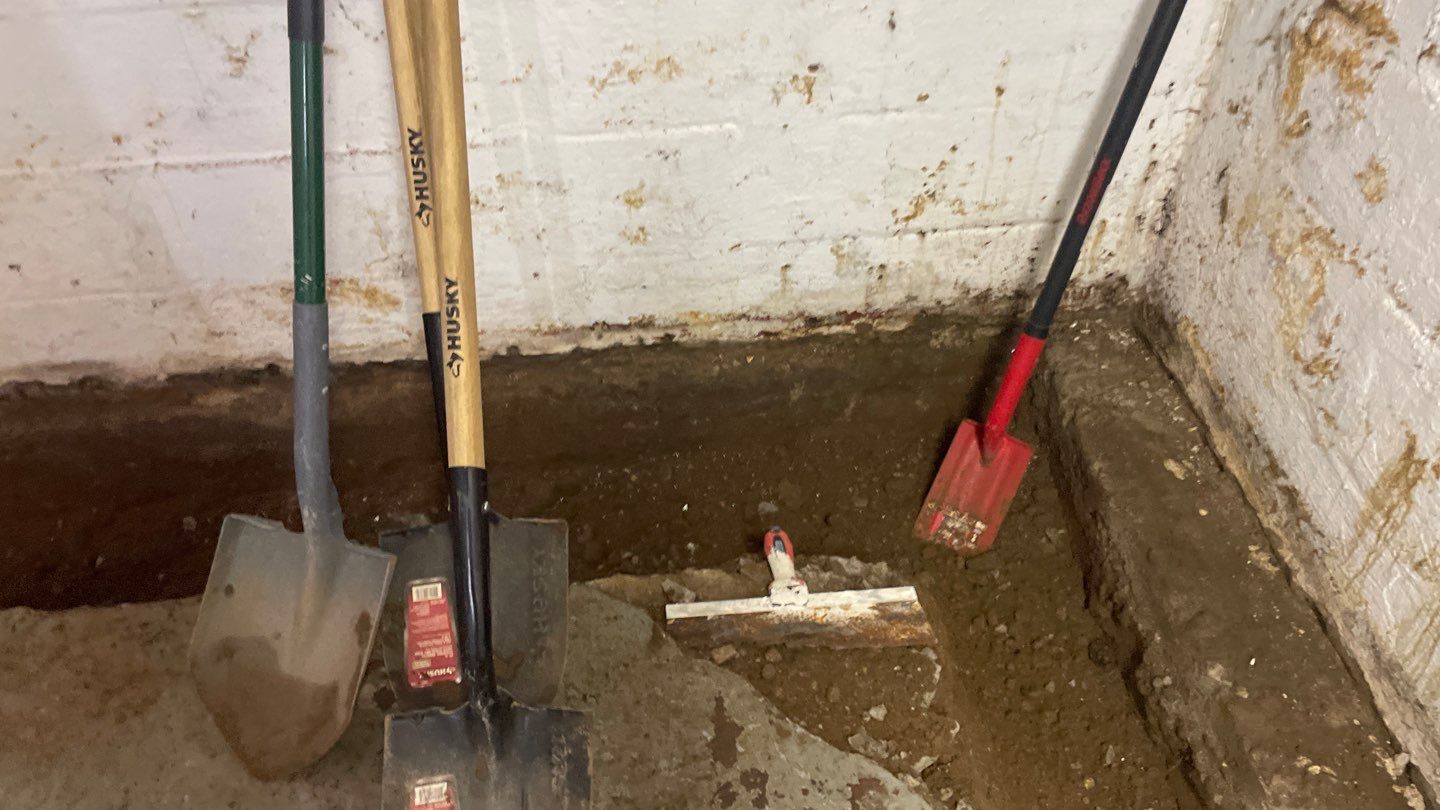 Interior Drain Tile & Yard French Drain in St. Paul, MN by Waterproofing Northeast