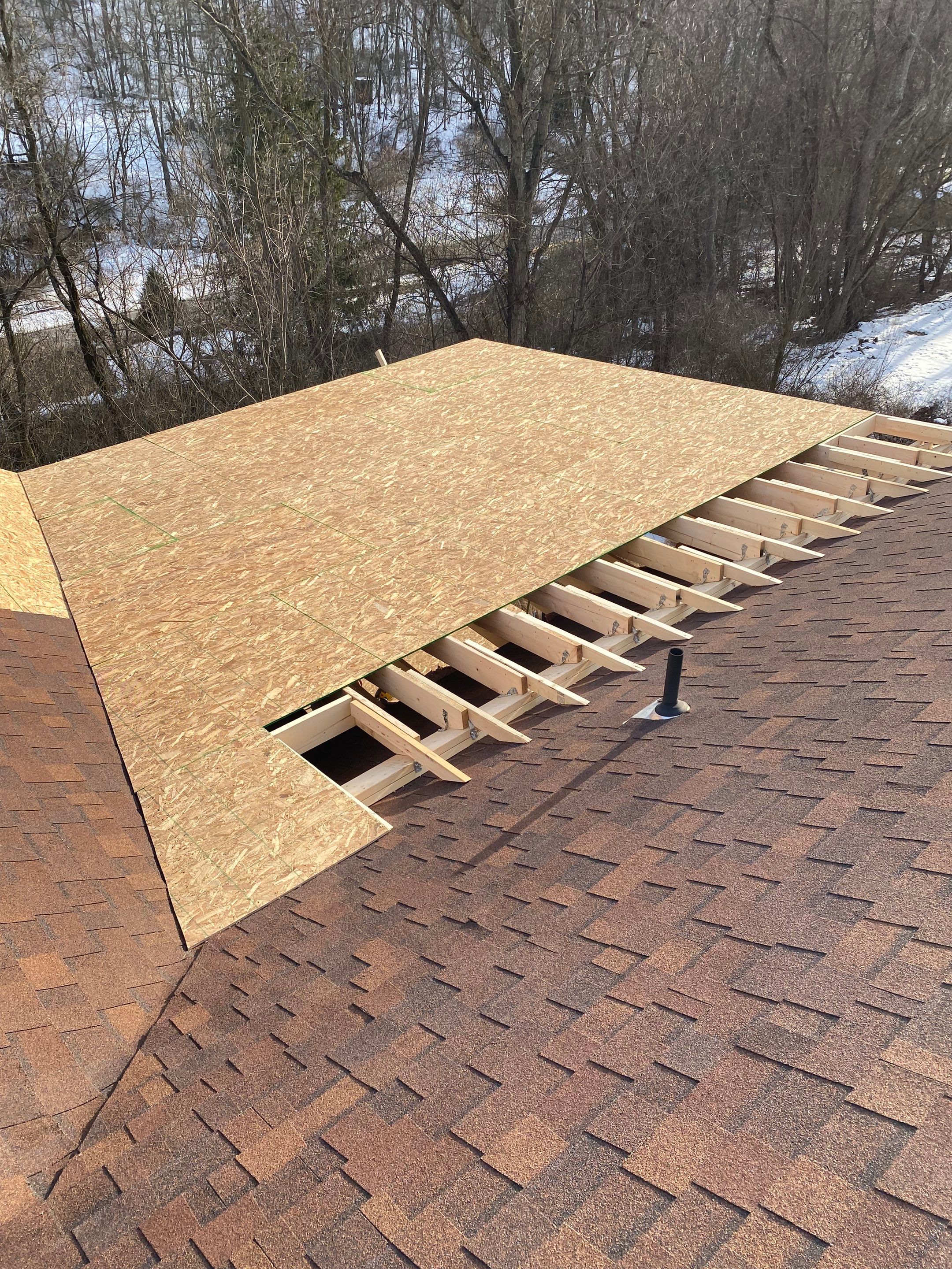 Deck and Roof Build by Cousins Roofing Siding & Decks