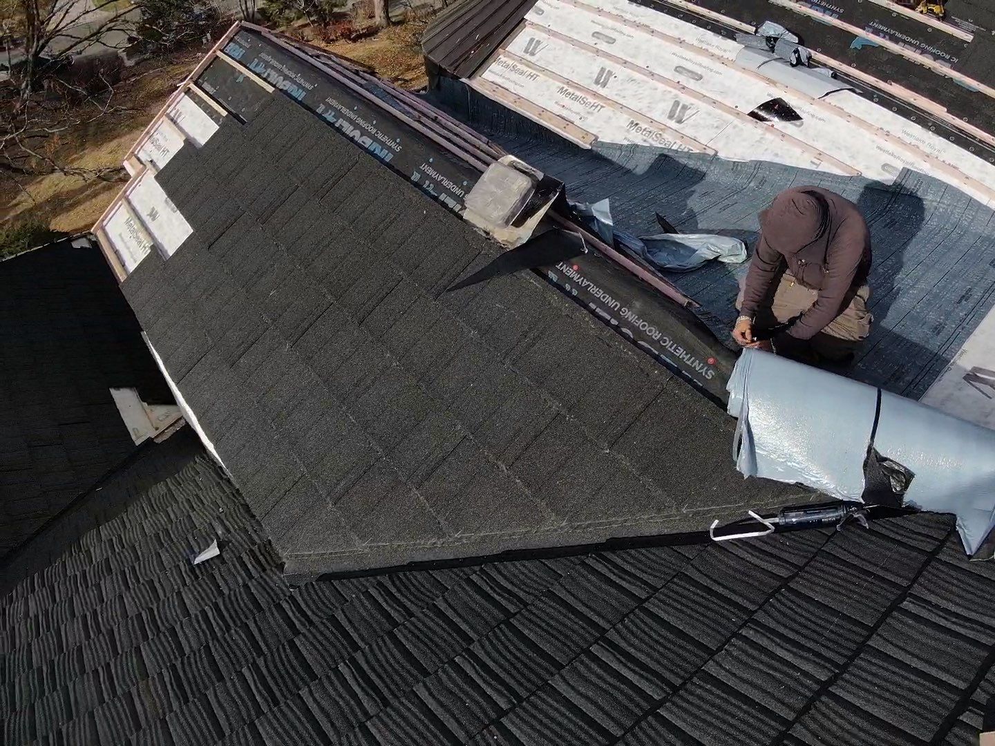 Unified Stone Coated Roof & Stucco Remodle by Blue Peaks Roofing LLC