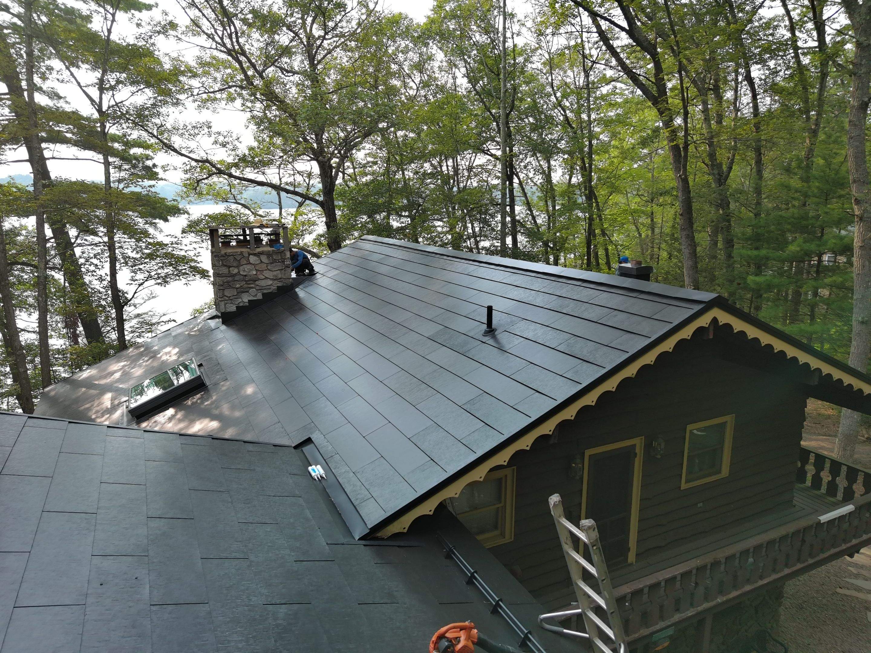 Stunning Tesla Solar Roof Cabin in the Woods by American Home Contractors