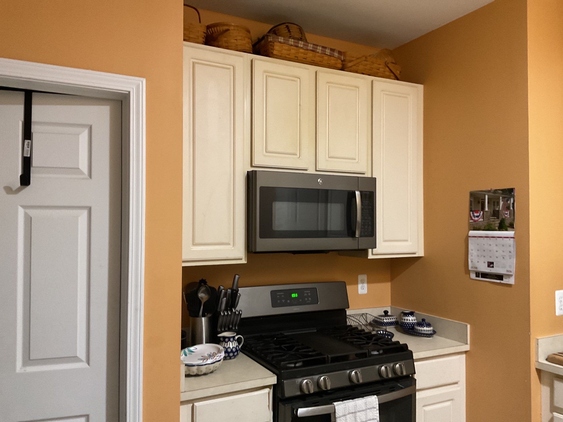 Modern Navy Blue Cabinet Refacing with Quartz countertop replacement in Harrison Township by Top Shelf Painter