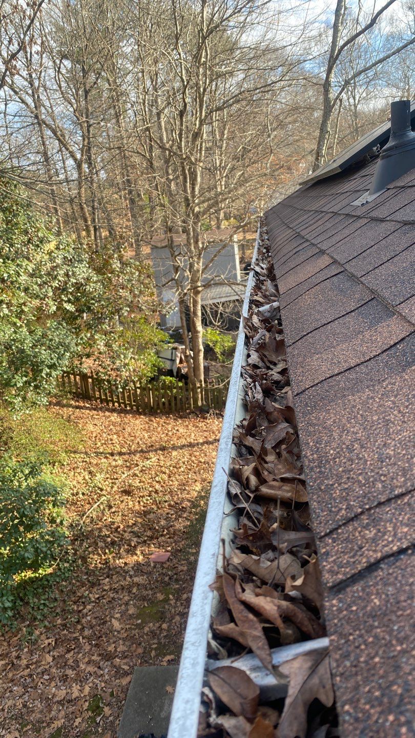 Cleaning Gutters  by Deerfield Roofing LLC