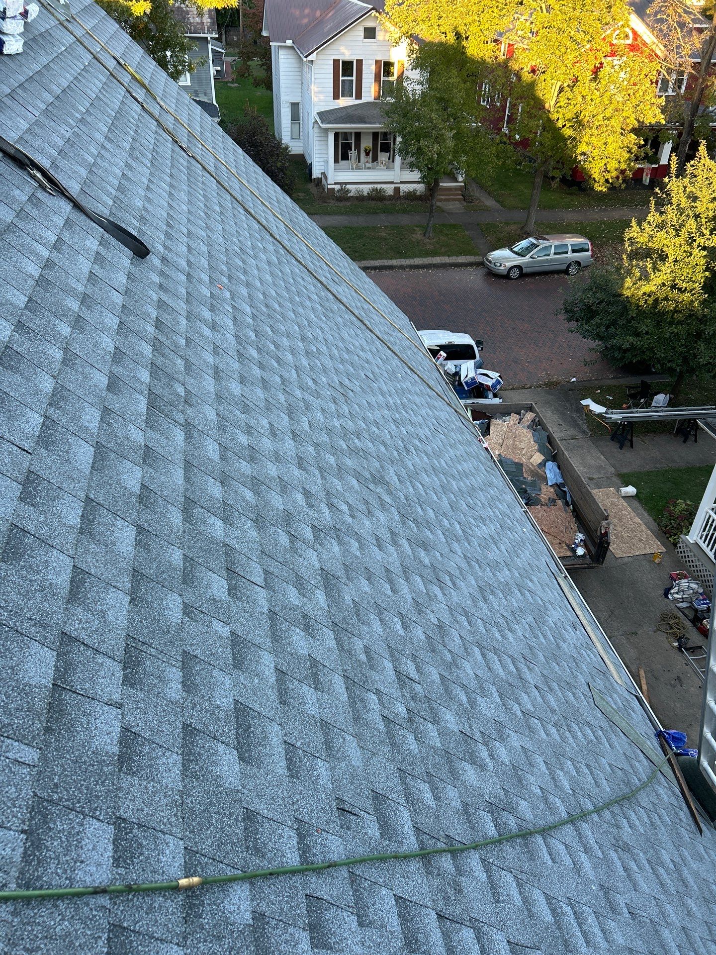 Residential Roofing Installation using GAF Timberline HDZ Oyster Grey by Rainstoppers Roofing