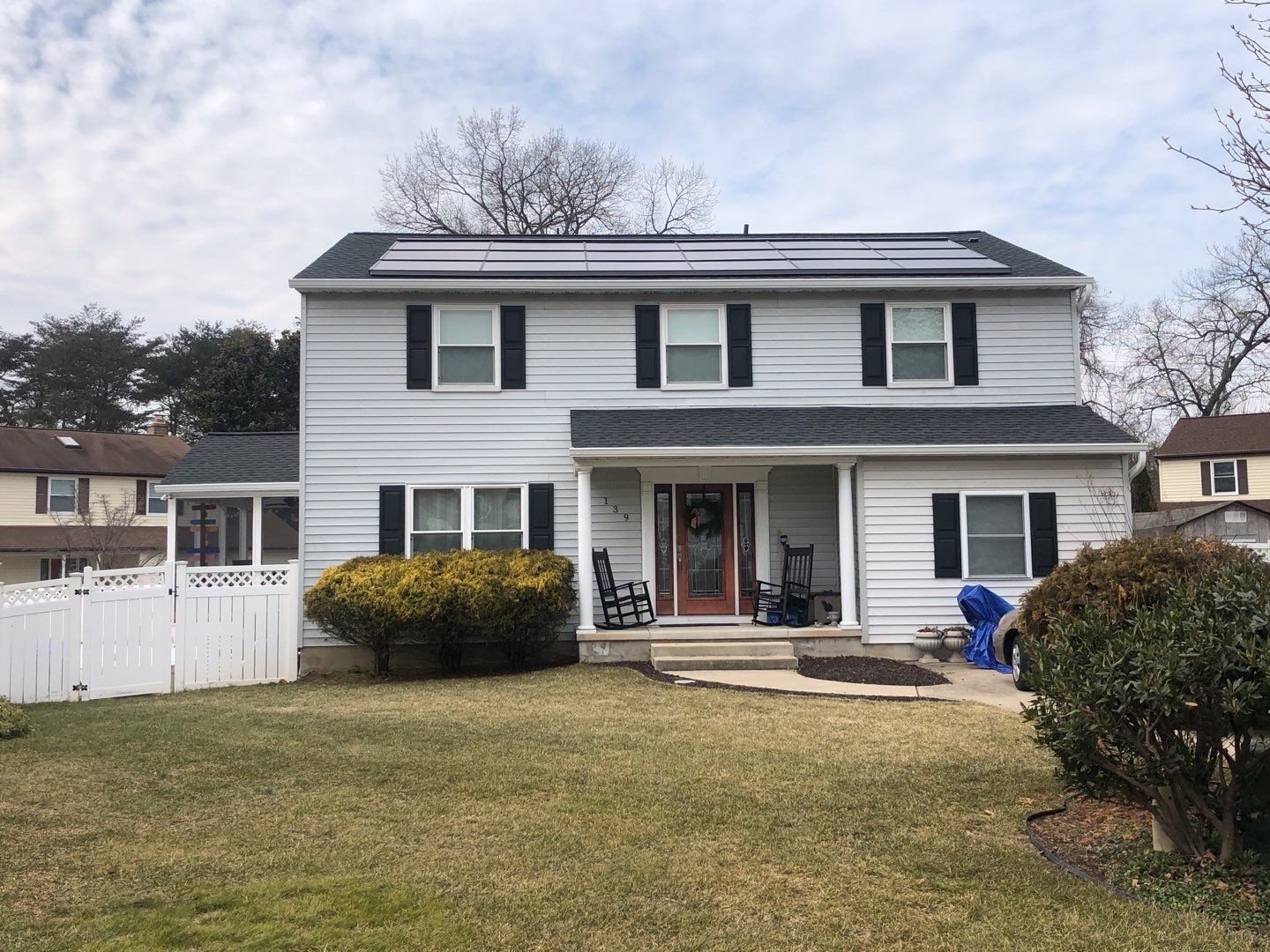 Roof Replacement with GAF Decotech integrated solar panels by American Home Contractors