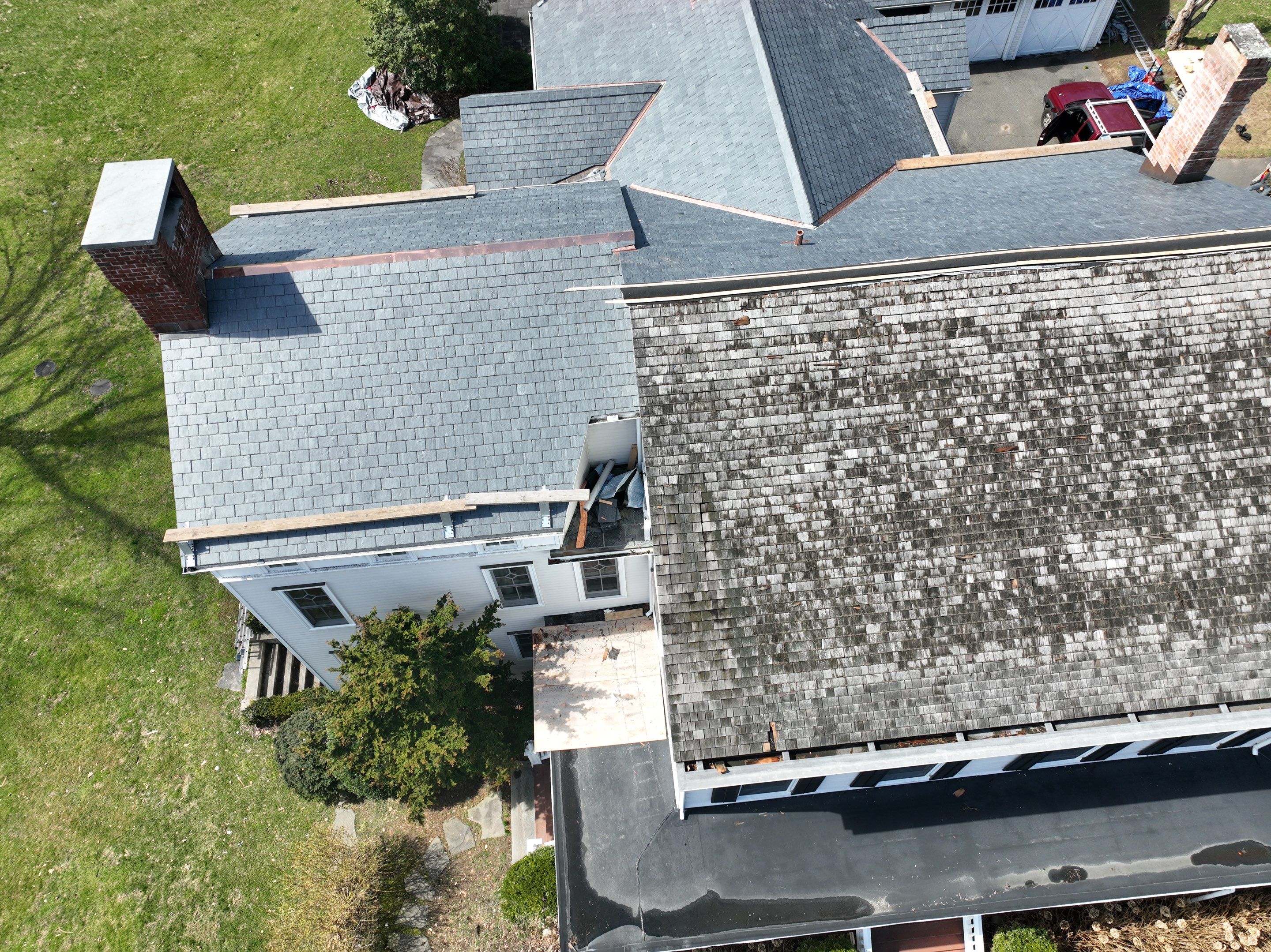 Residential Roofing Installation using Vermont Slate by A Plus Exterior