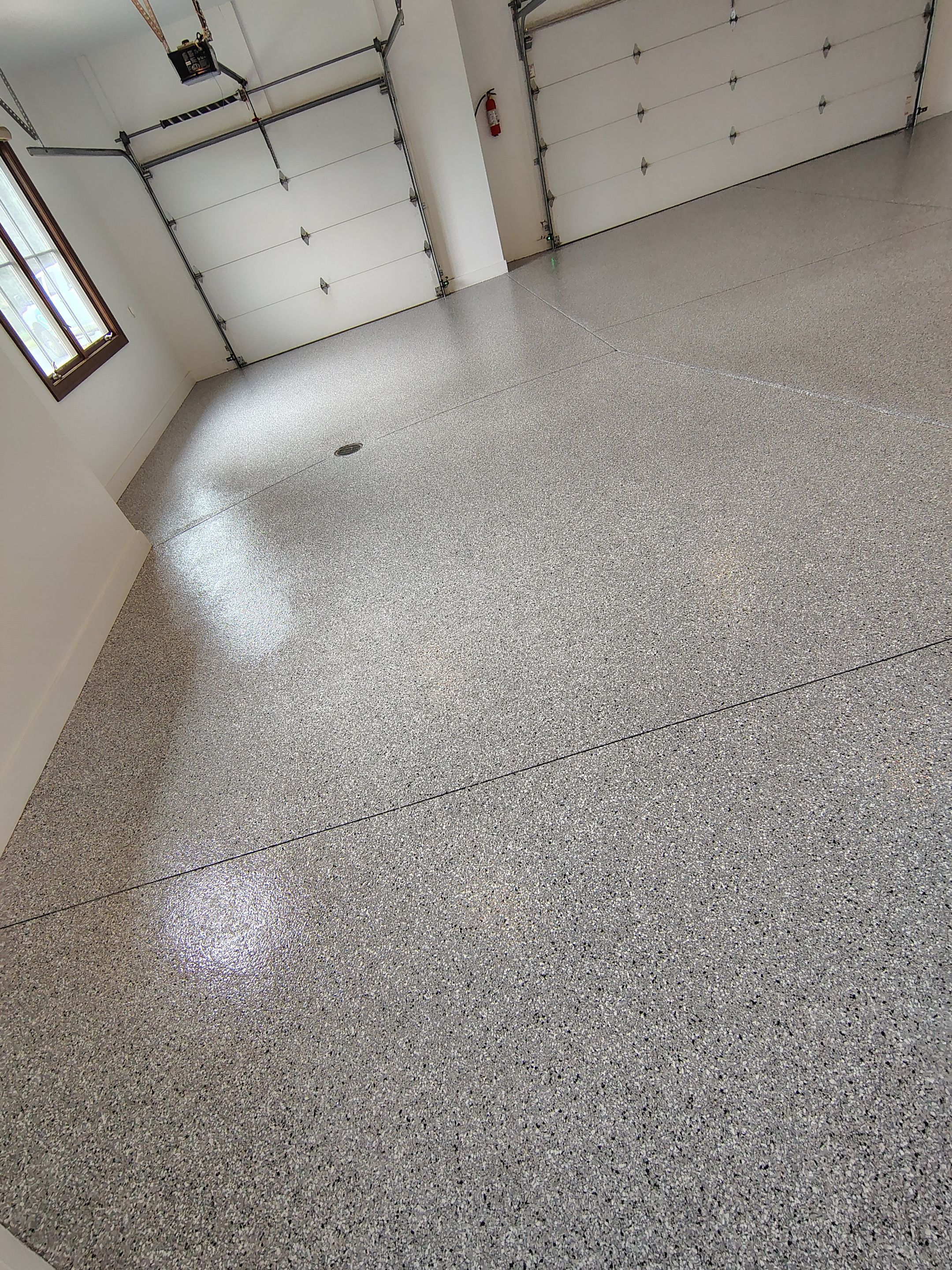 Feather Grey Floor Coating in Sioux Falls, SD by Select Painting, Coatings & Garage Cabinets