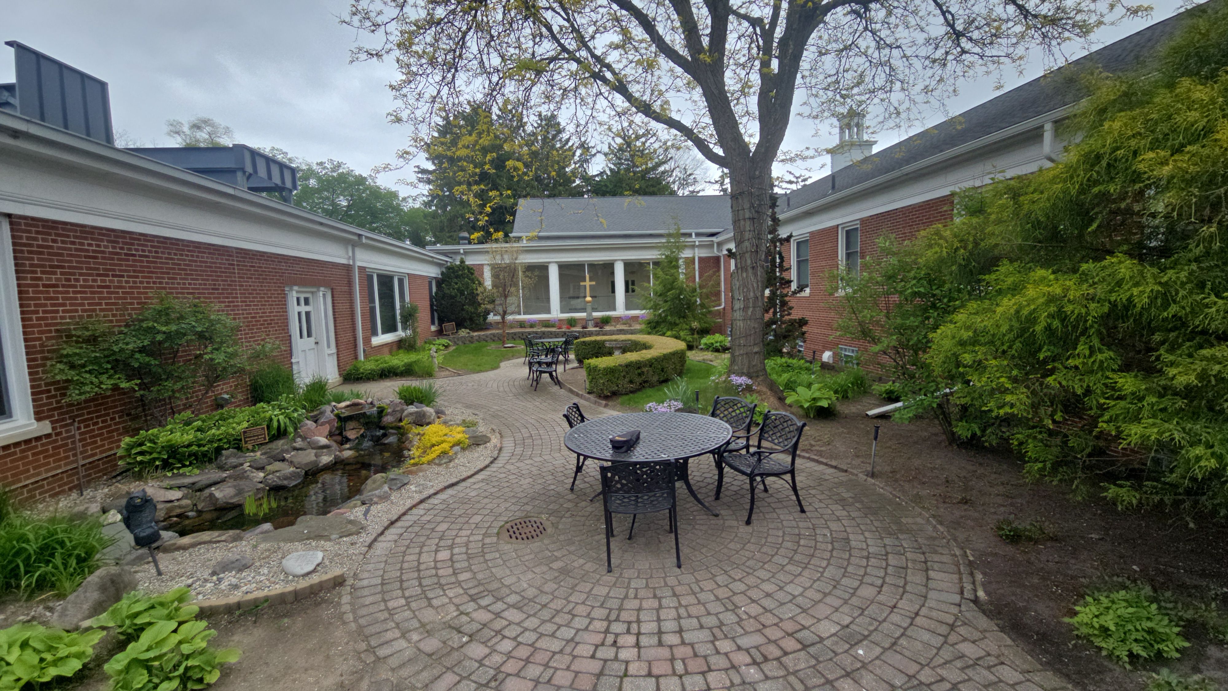 Commercial Wood Trim Restoration and Gutter Replacement in Birmingham by Top Shelf Painter