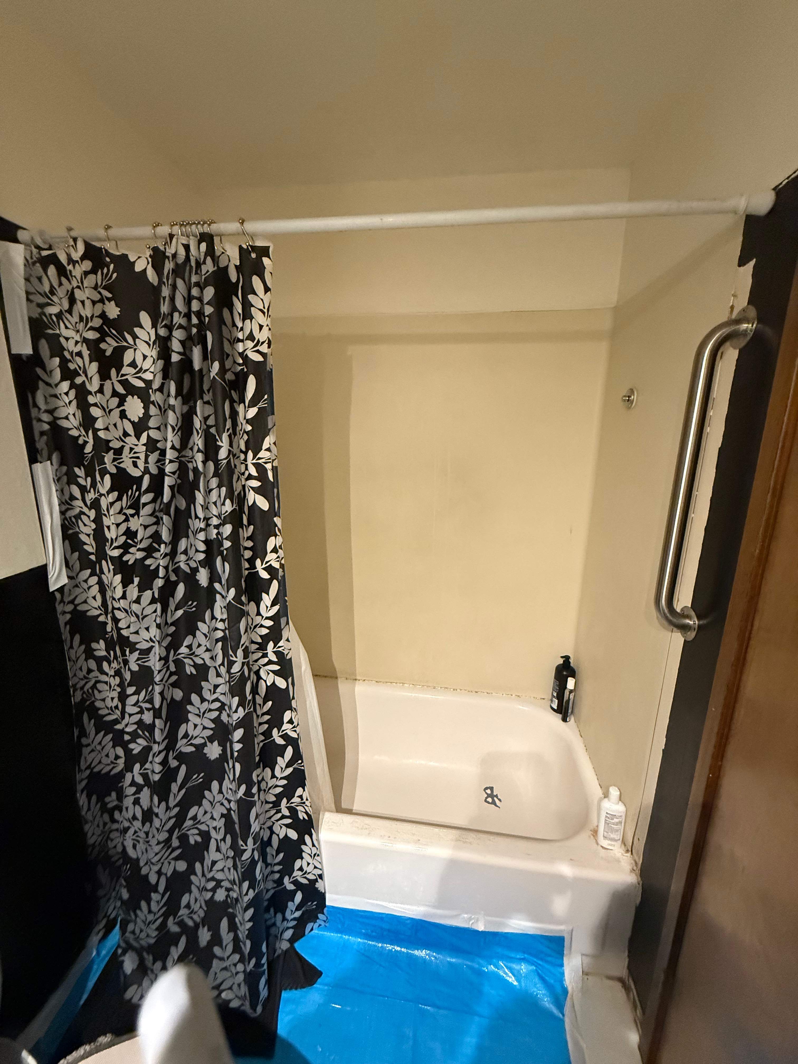 Modern Oatfield Bathroom Remodel Featuring Charcoal Shower and Dark Accents by American Made Construction 