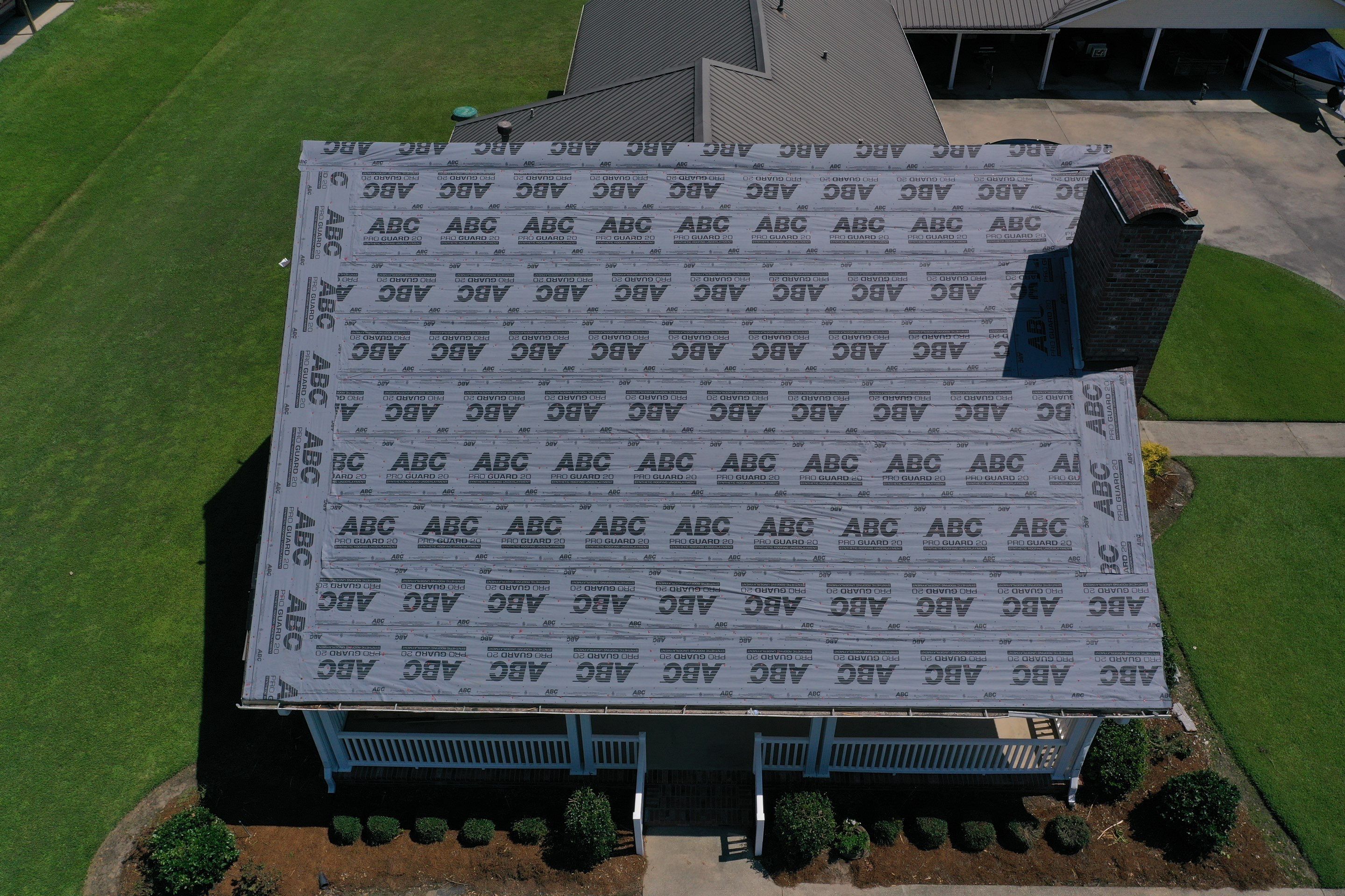 Standing Seam Metal Roof Installation by Top Team Construction