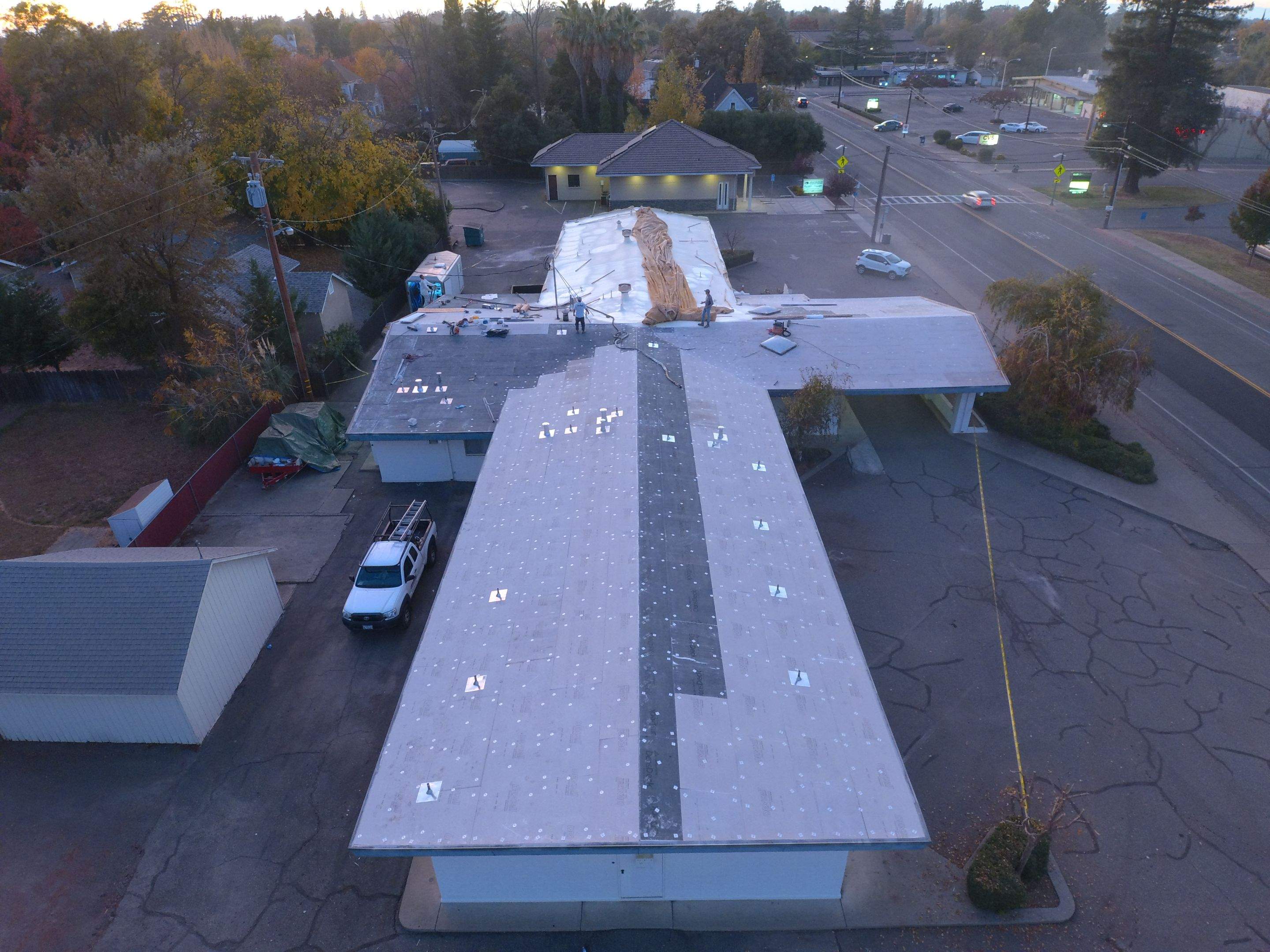 Spray foam and coatings using Conklin Benchmark/PUMA XL coatings and spray foam by Straight Edge Roofing Inc