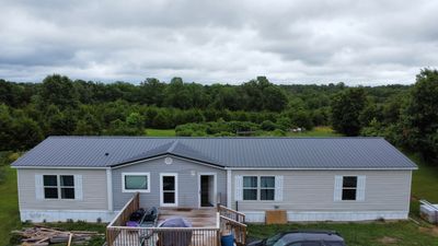 Residential Roofing Install - 29 Guage G-Rib Metal - Color Black Frost 