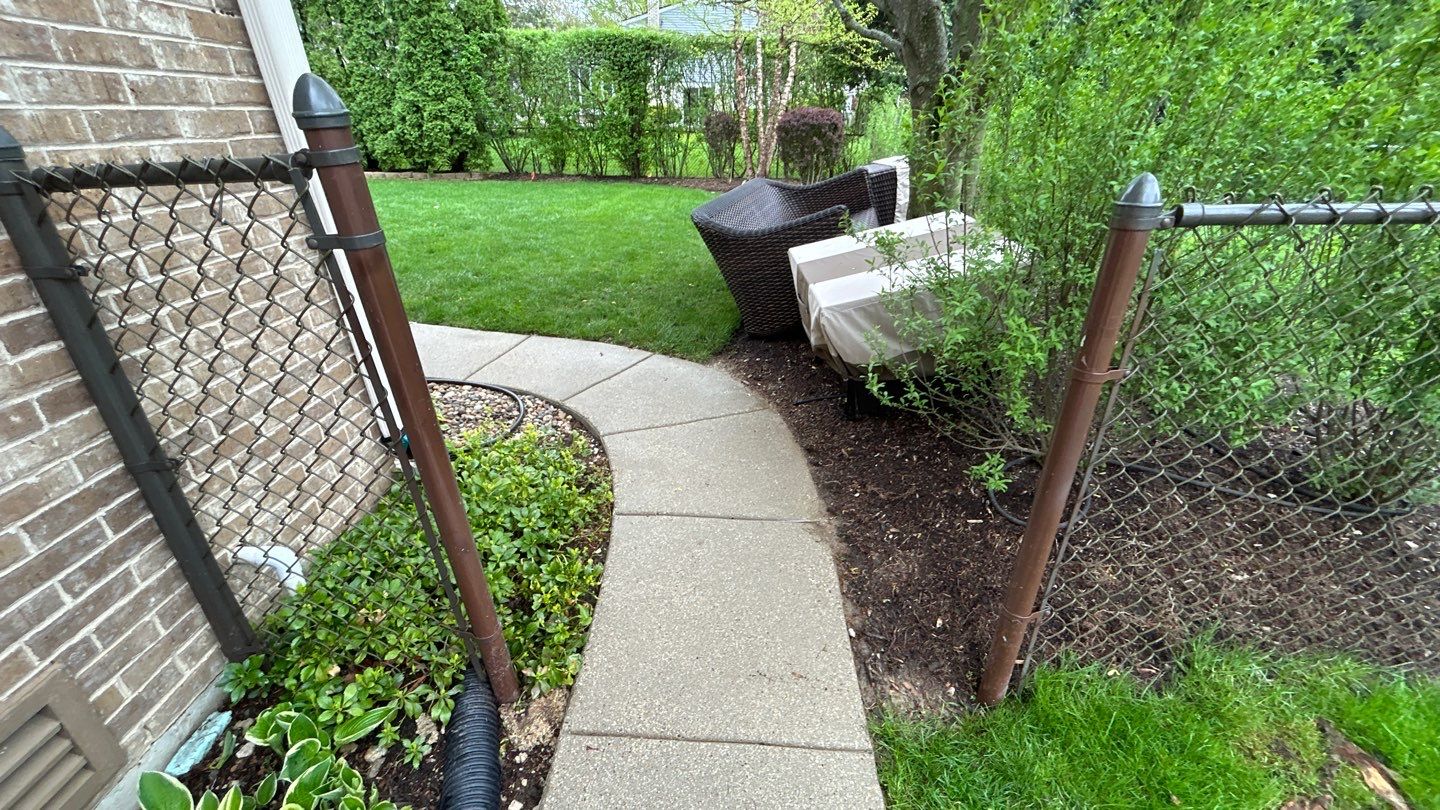 concrete patio and driveway cleaning by Northern Power Washing LLC.