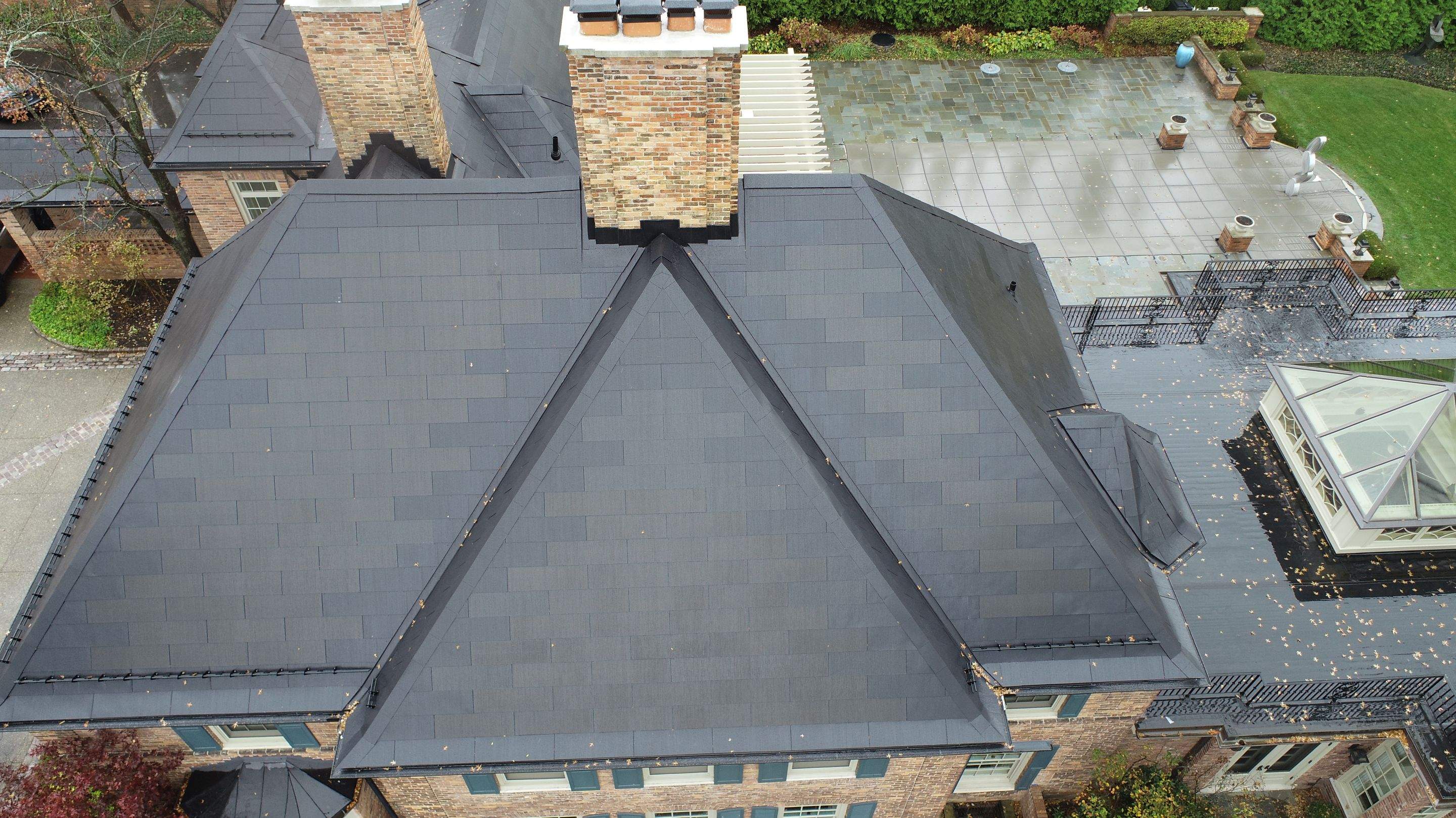 Tesla Solar Roof Replacement  by American Home Contractors