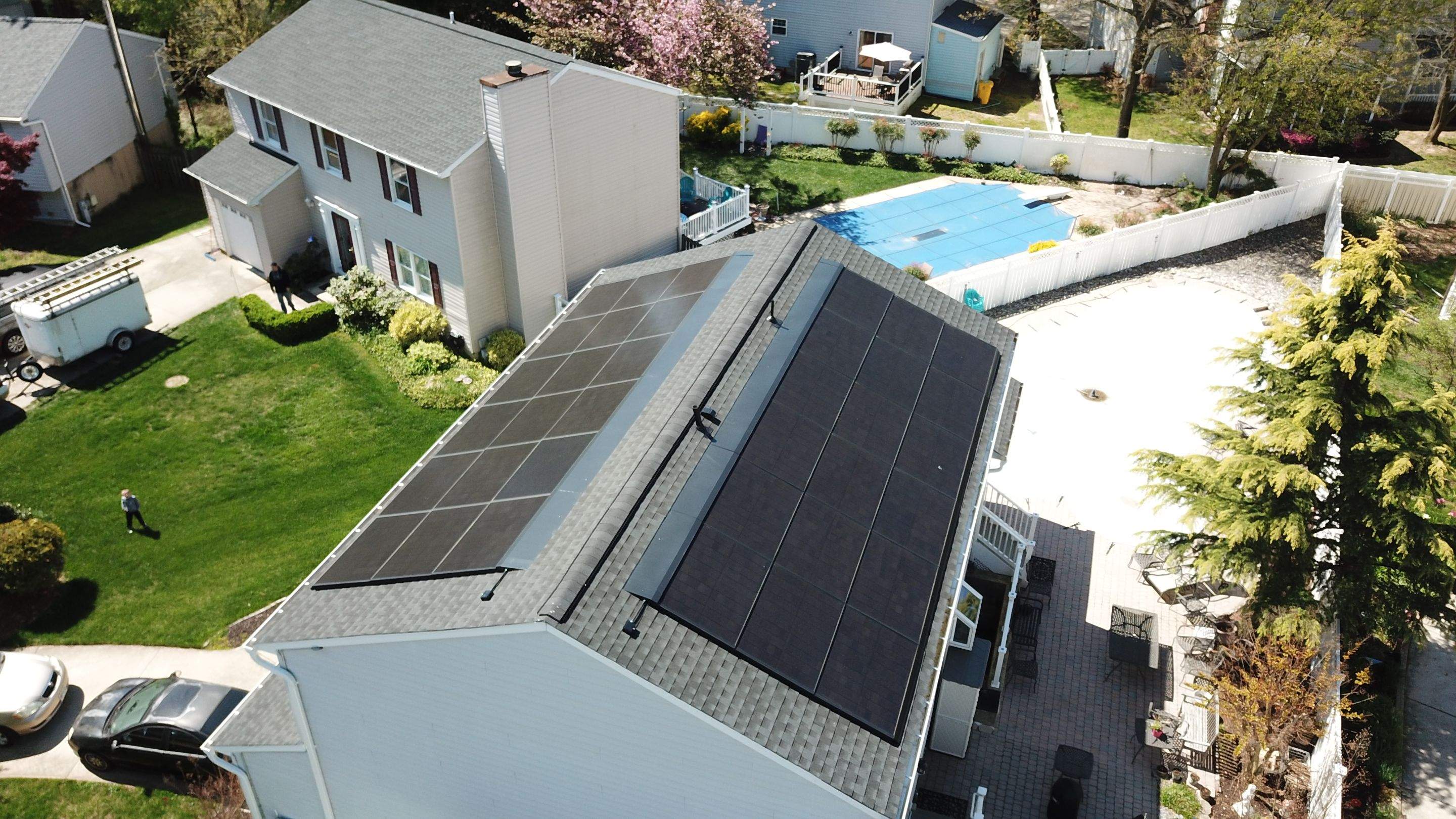 Roof Replacement with GAF Decotech integrated solar panels by American Home Contractors