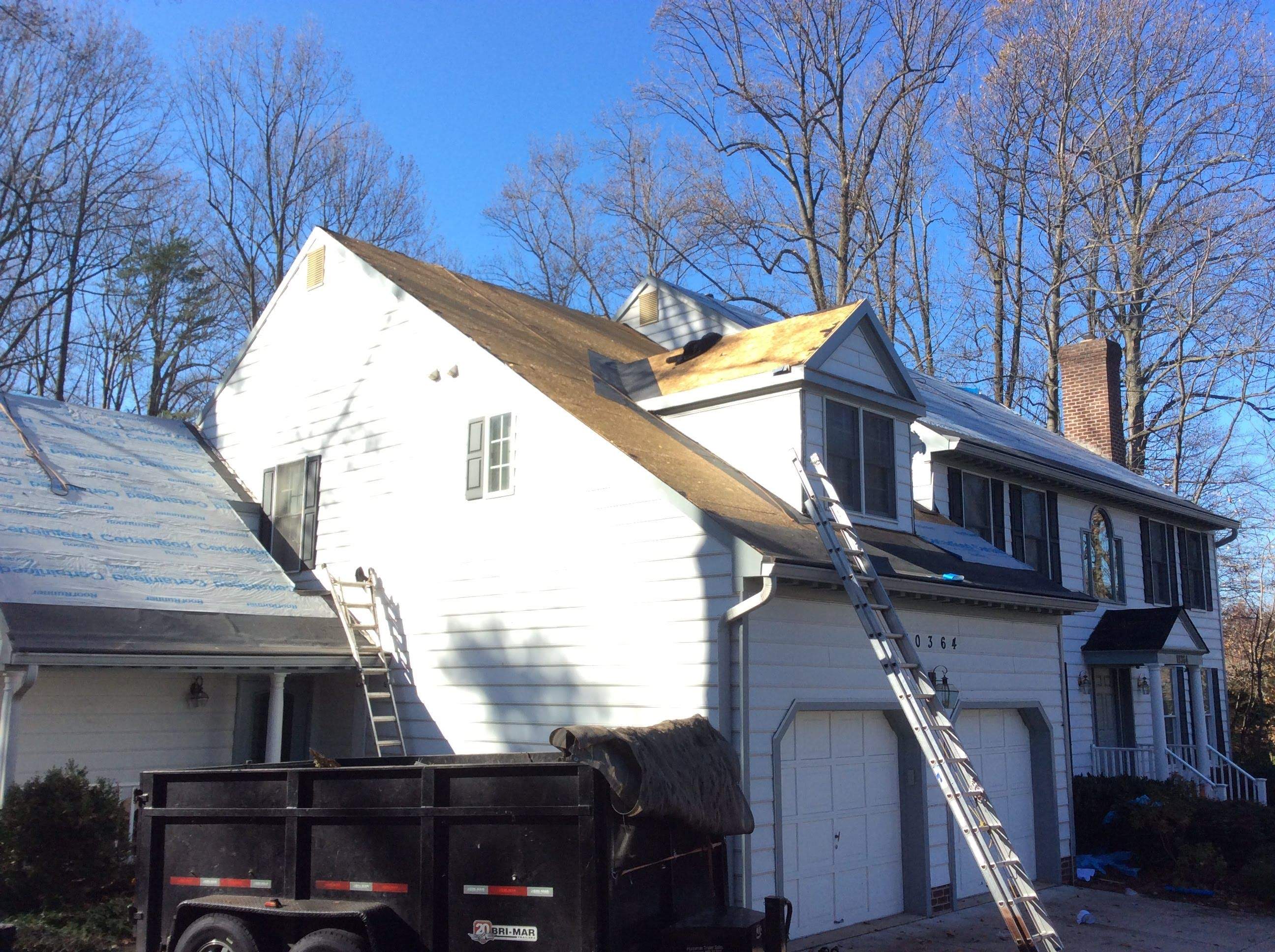 Residential Roofing Installation using Charcoal Black by Alpha Design Services
