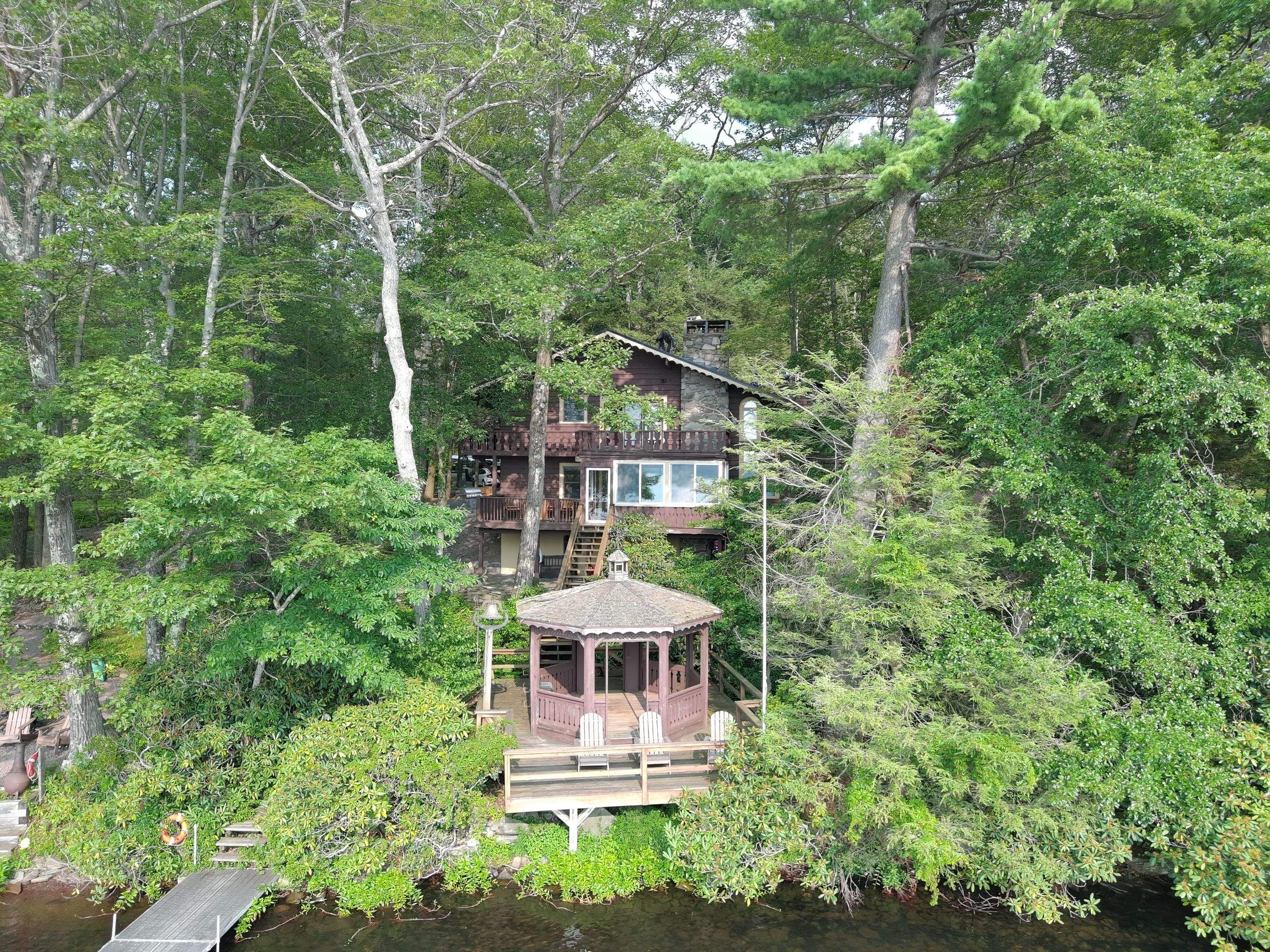 Stunning Tesla Solar Roof Cabin in the Woods by American Home Contractors