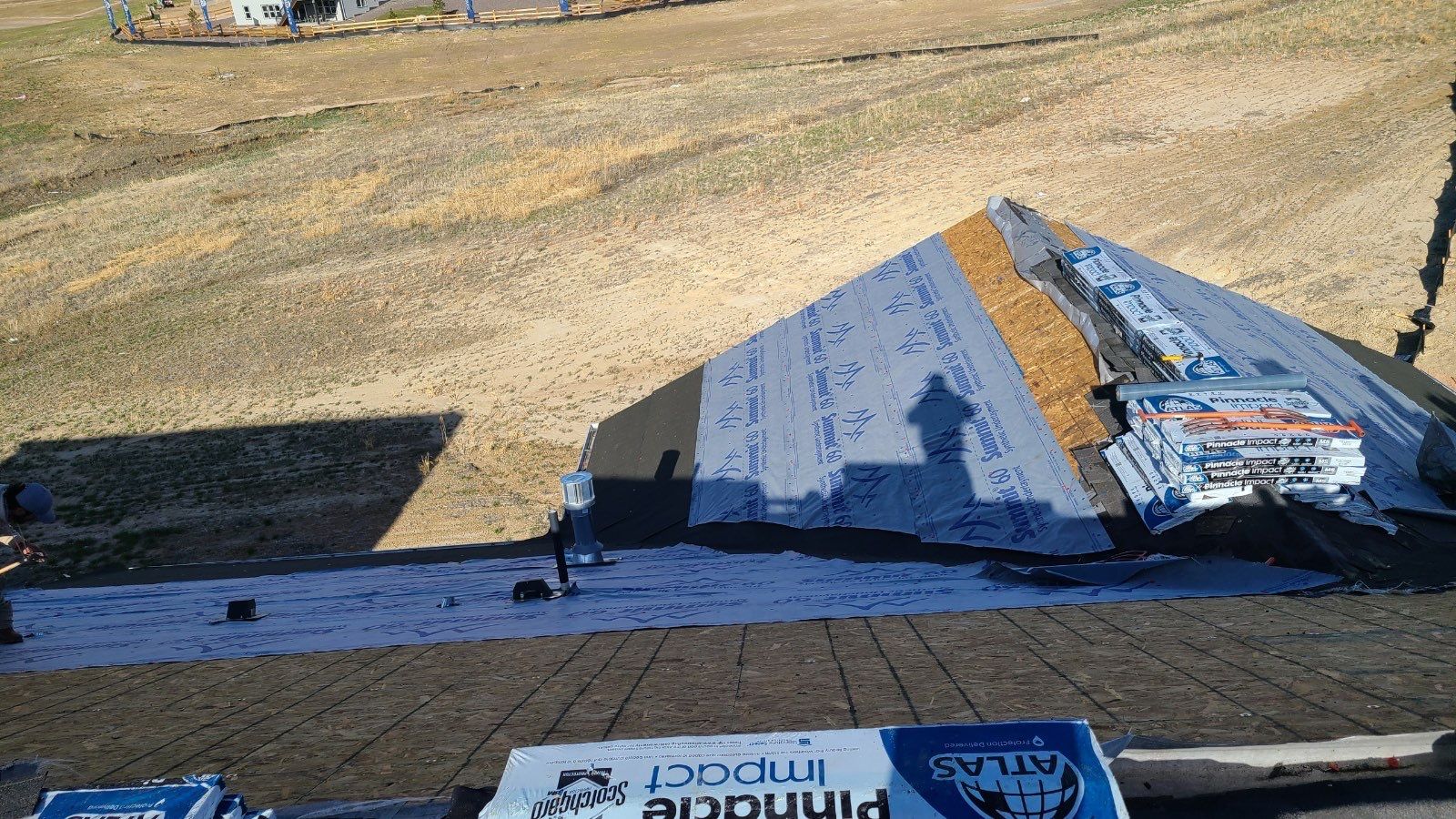 Residential Roofing Installation using Atlas Pinnacle Impact Black Shadow by Blue Peaks Roofing LLC 