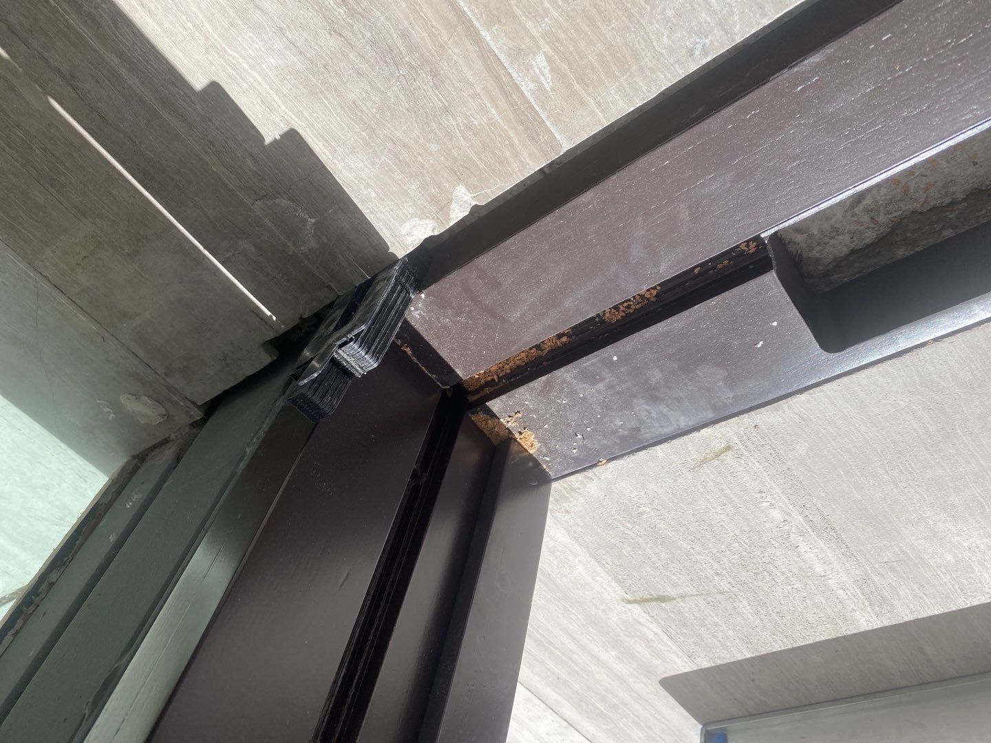 Custom Material Pivot Door installation by Impact Precious Wood Inc.