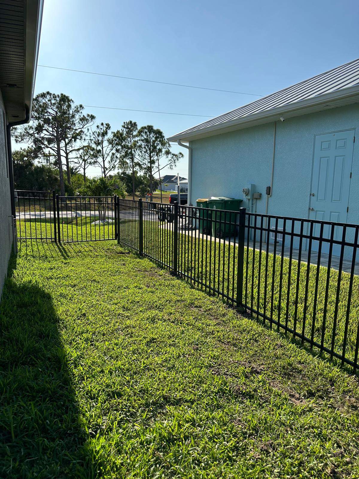 Waterfront Black Aluminum Fence Installation in Port Charlotte by True Fence LLC