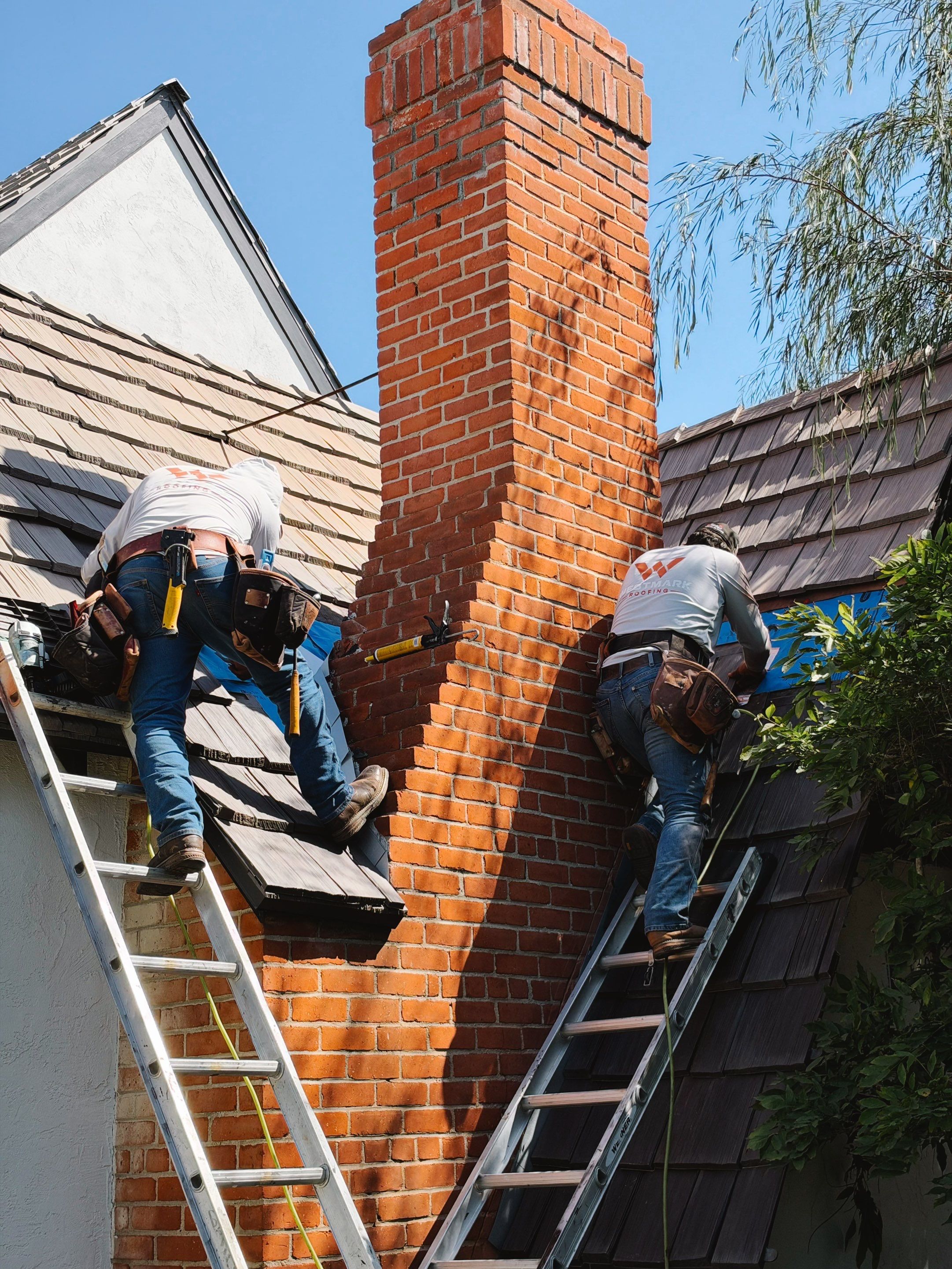 Composite Shake Roofing and Custom Chimney Cricket Installation in San Diego by Westmark Roofing