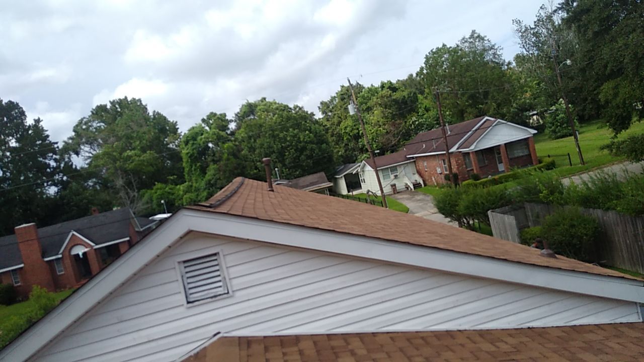 Residential Roofing Installation using Roof Replacement by American Roofing & Construction LLC