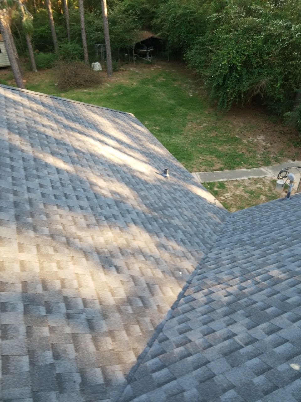 Residential Roofing Installation using Roof Replacement by American Roofing & Construction LLC