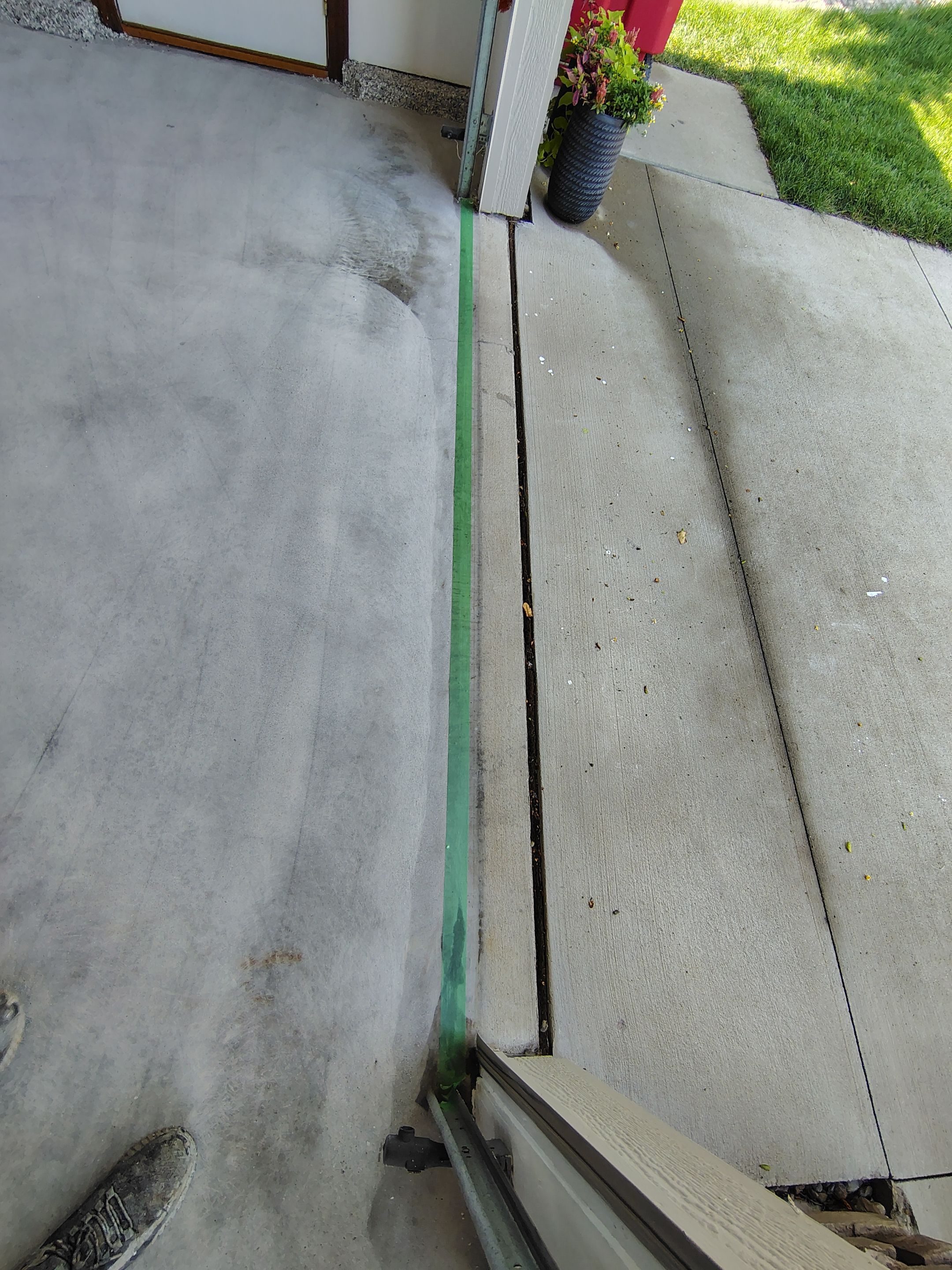 Coyote Garage Floor Coating in Sioux Falls by Select Painting, Coatings & Garage Cabinets