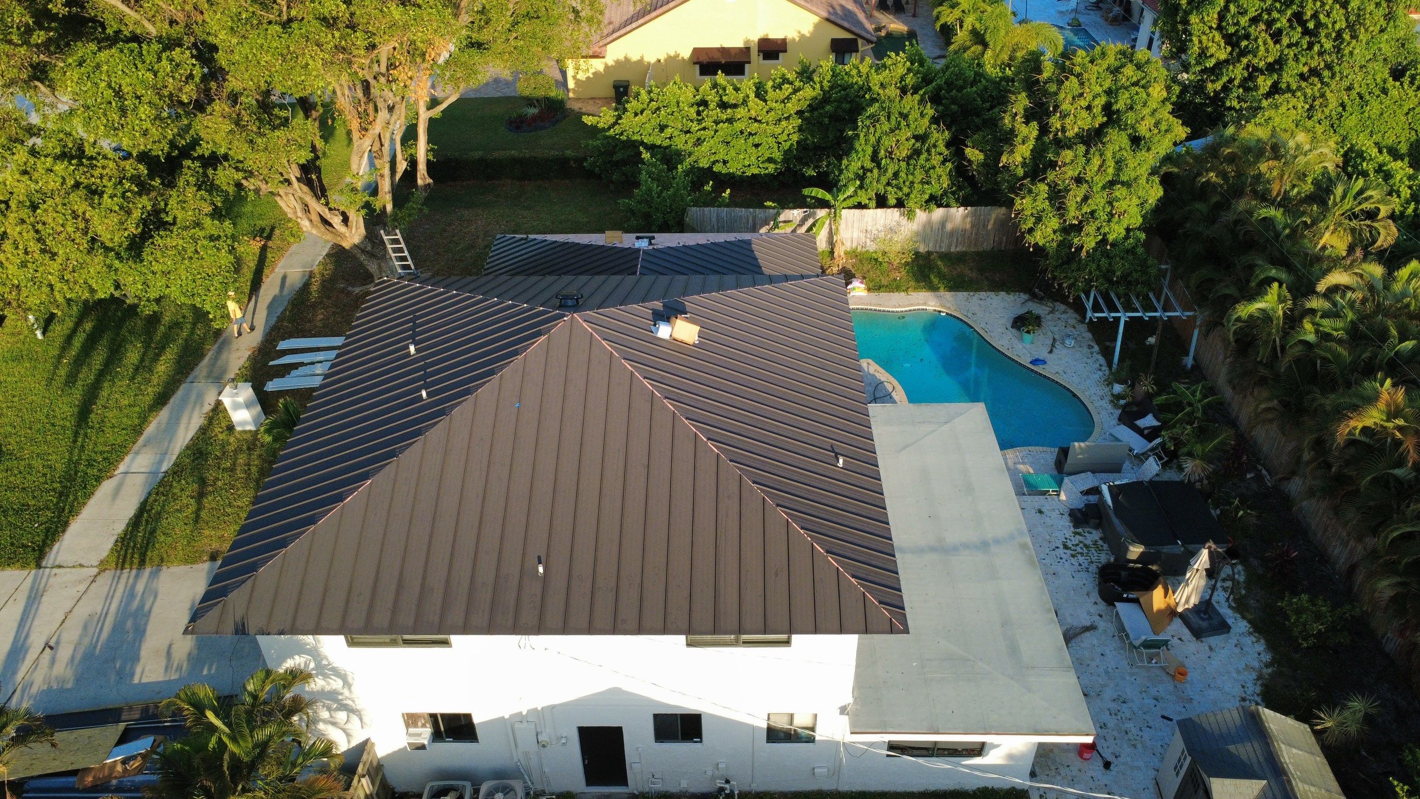 Residential Roofing Installation using 1.5'' Mechanical Seam by BLUES BROTHERS ROOFING