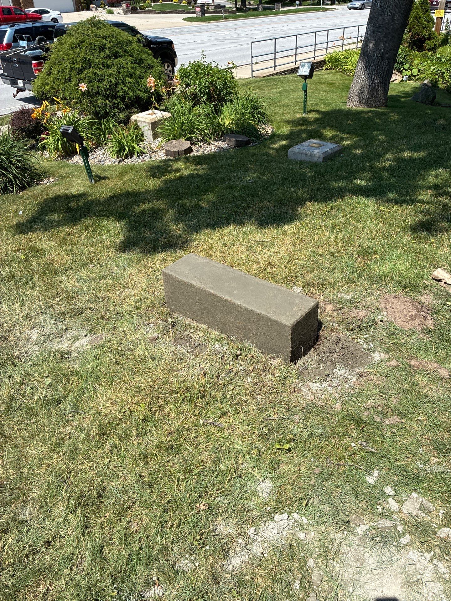 Custom Monument Signage and Concrete Foundation Installation in Granger by Hayes Design co