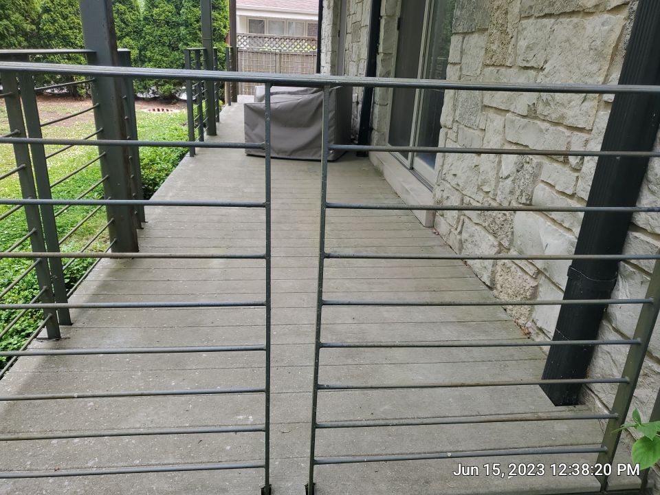 Highland Park, IL Bluestone, concrete,  Trex deck cleaning by Northern Power Washing LLC.