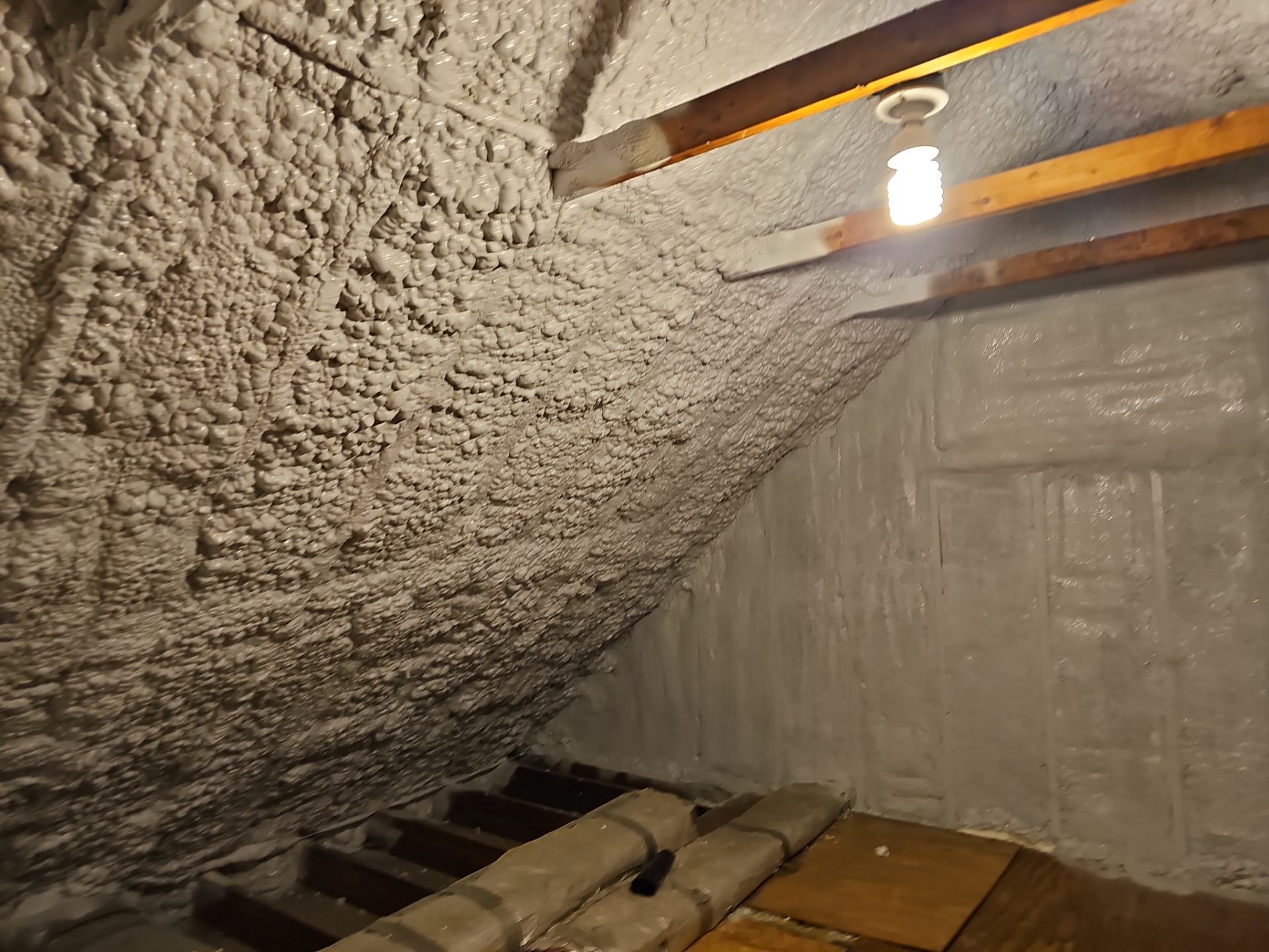 Attic Retrofit using open cell spray foam by NYS Foam & Energy