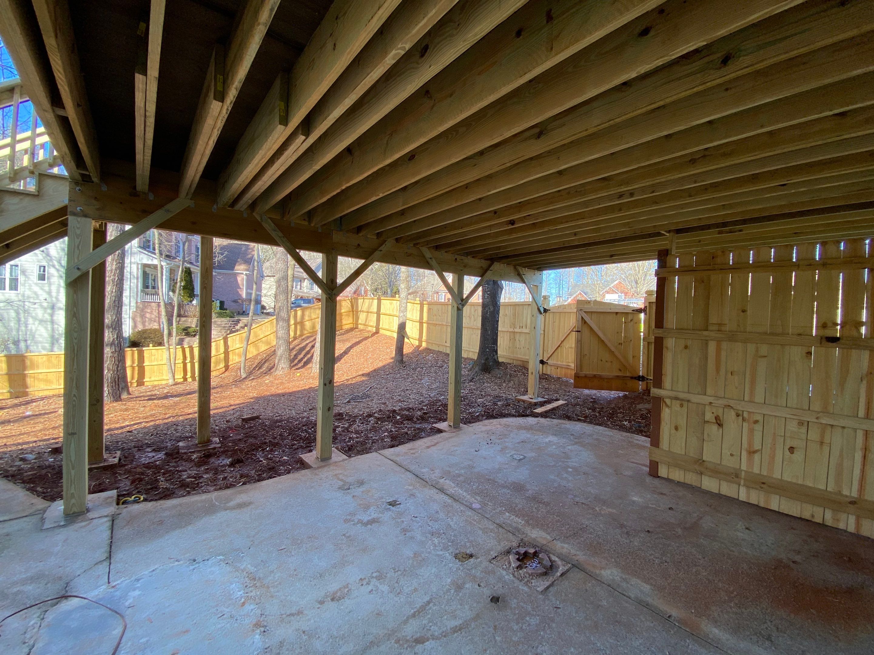 Covered Porch Addition and Custom Privacy Fence Installation in Alpharetta by Swift Home Renovations
