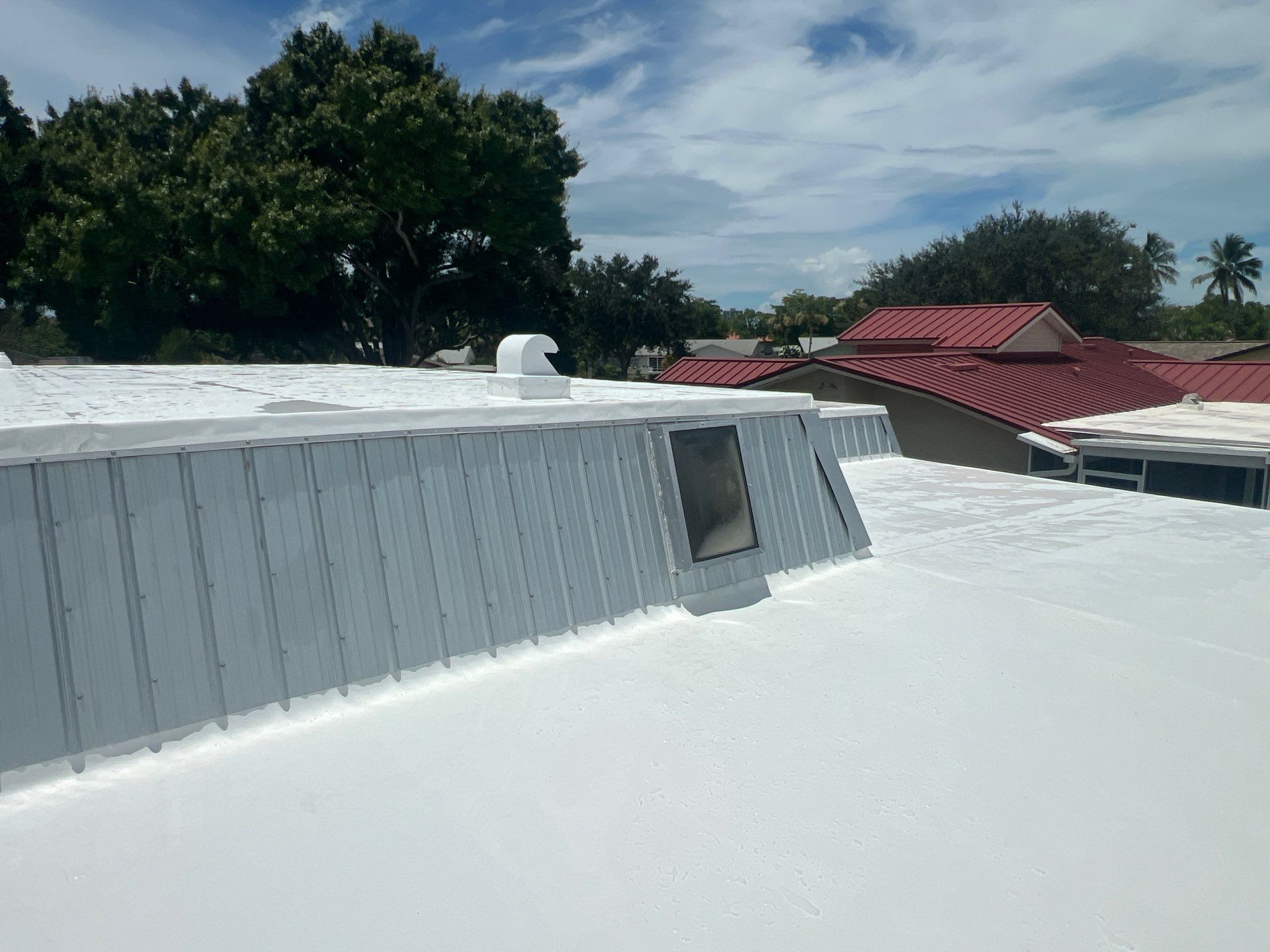 Residential Roofing Installation using TPO Roofing System & Tuff Rib Metal  by Durabilis Roofing INC