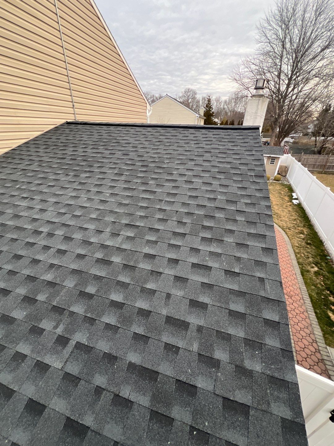 Estate Gray Shingles by Reimagine Roofing