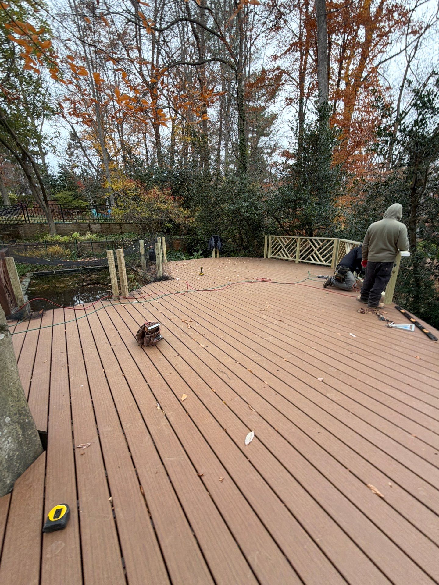 Custom Composite Deck Replacement with Geometric Railing in Bethesda, MD by Jakari Restoration & Construction LLC