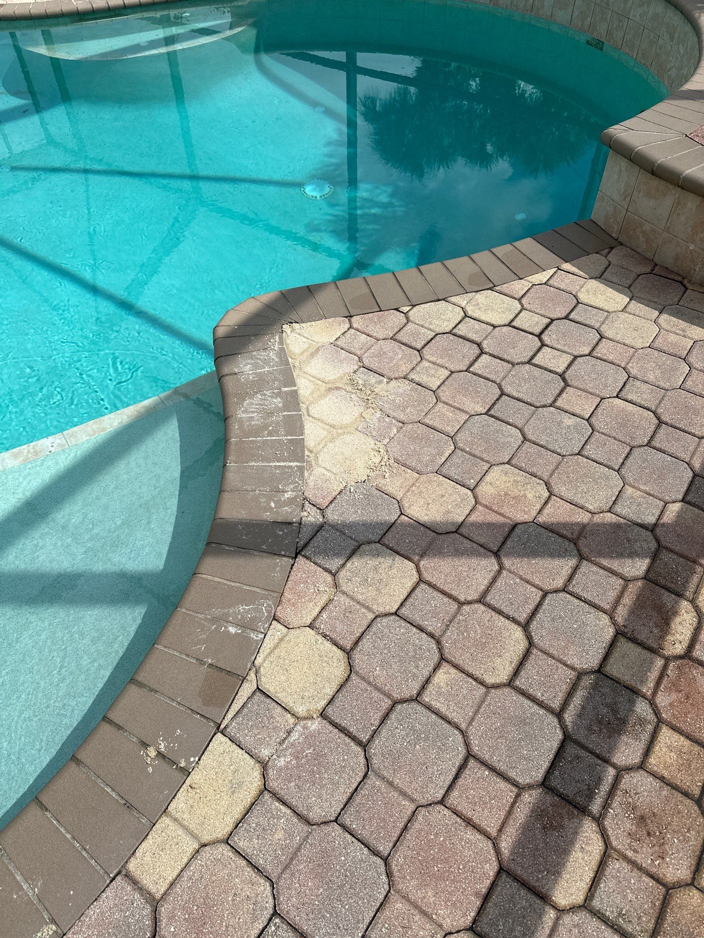 Paver Cleaning and Sealing pool deck in Sun City Center by Supreme Paver Experts