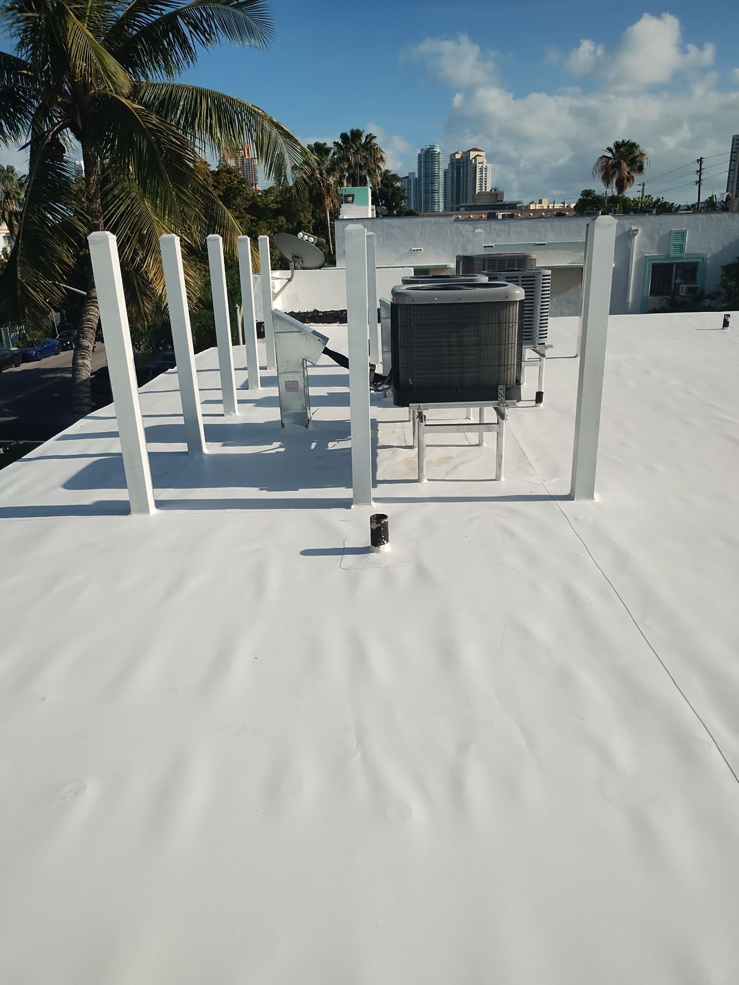 Miami Beach Condominium Complete Flat Roof and TPO Installation by AJF ROOFING INC