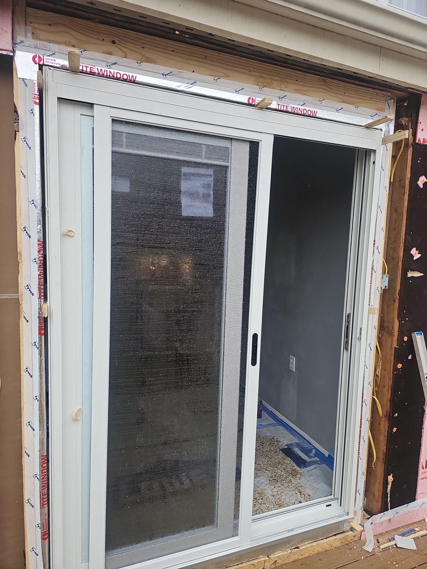 Deck and door by Cousins Roofing Siding & Decks