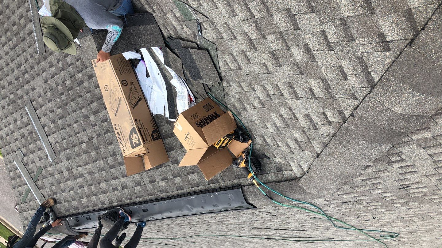 Residential Roofing Installation using Roof Replacement by American Roofing & Construction LLC