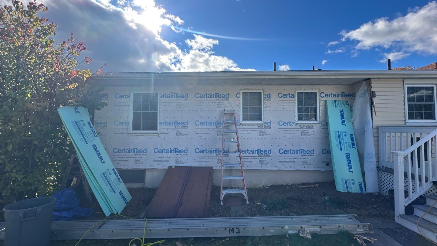 Transformative Siding update with Cert. Monogram D/4 x 12'6" Clapboard, Heritage Cream by DiGiorgi Roofing and Siding Inc