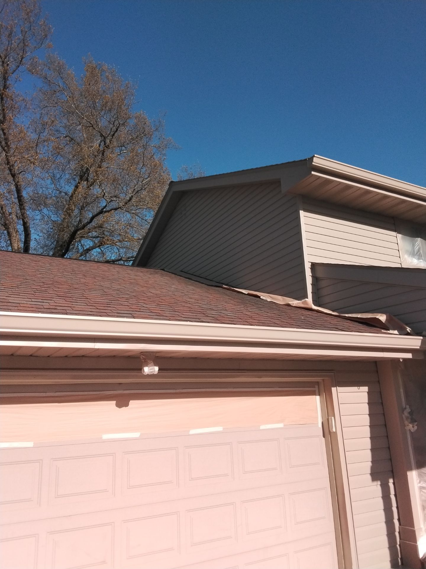 Residential Exterior Repaint Including Shop and Shed  by Midwest Paint LLC