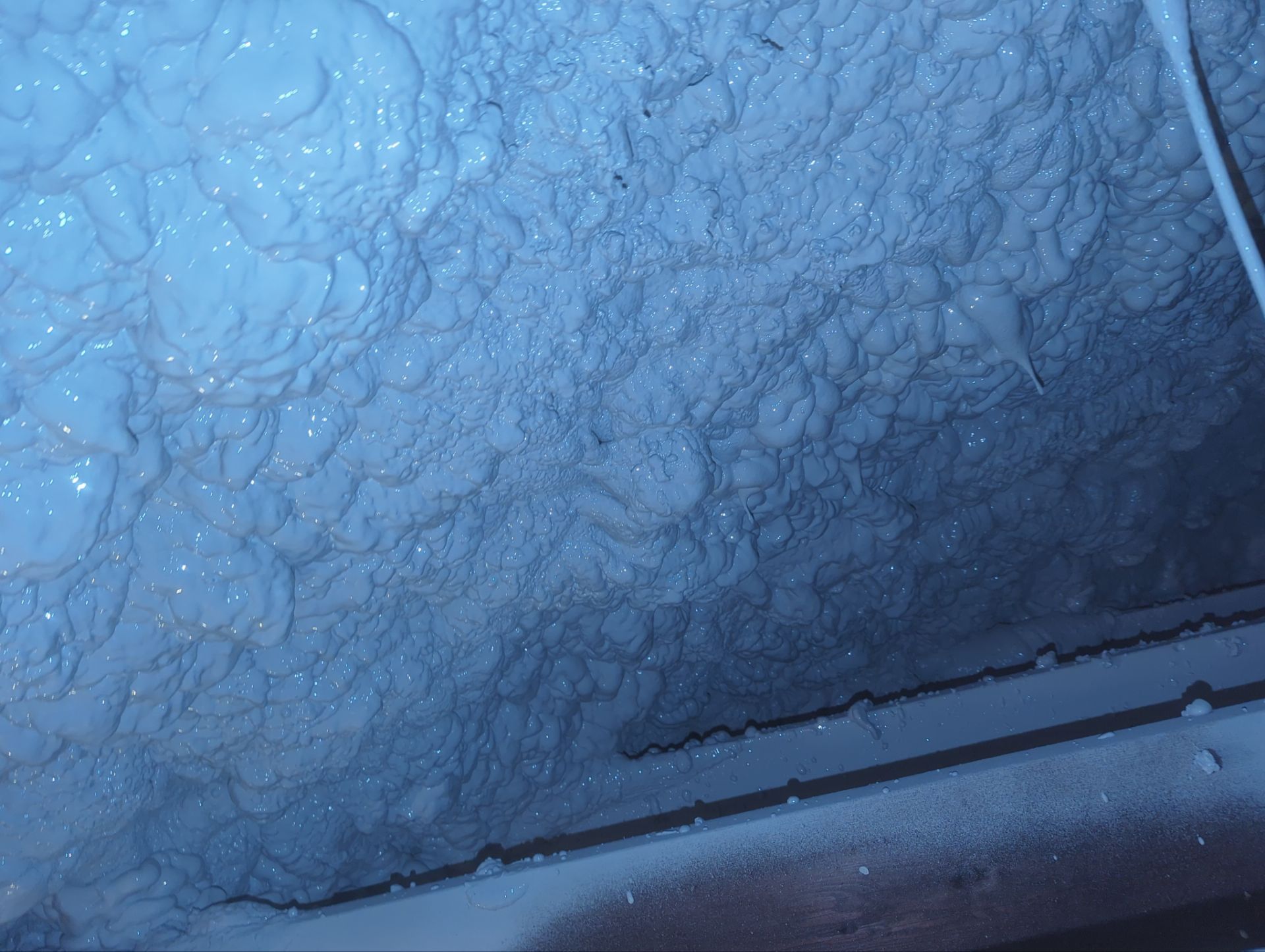 Attic Retrofit using open cell spray foam by NYS Foam & Energy